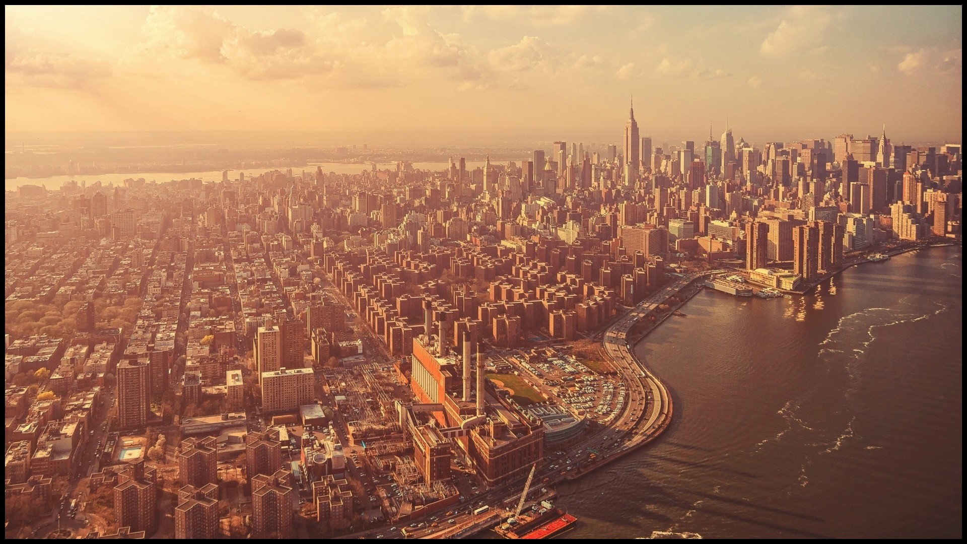 Aerial view of New York City skyline at sunset HD Wallpaper