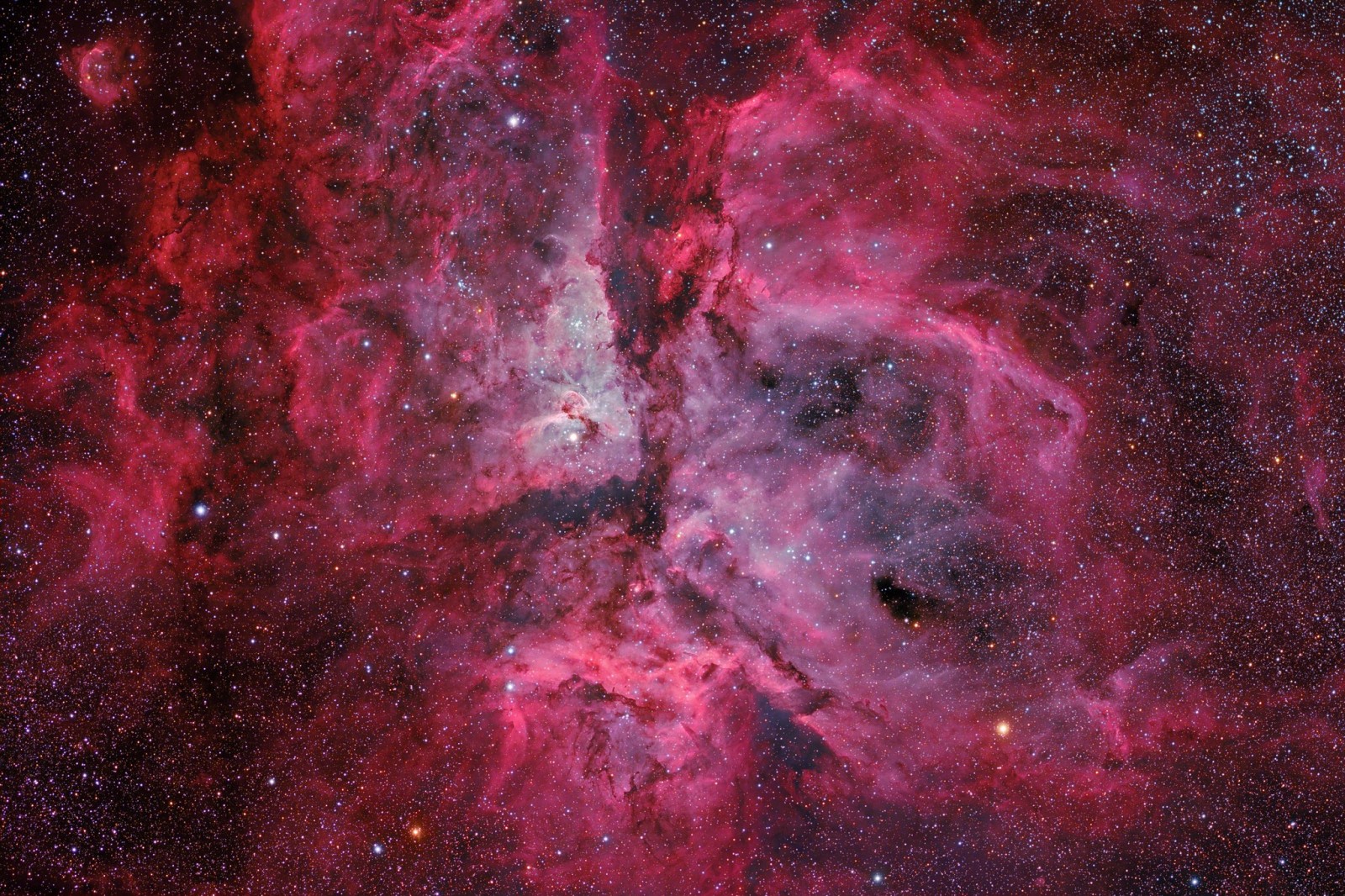 Carina Nebula in space with stars and gas clouds HD Wallpaper