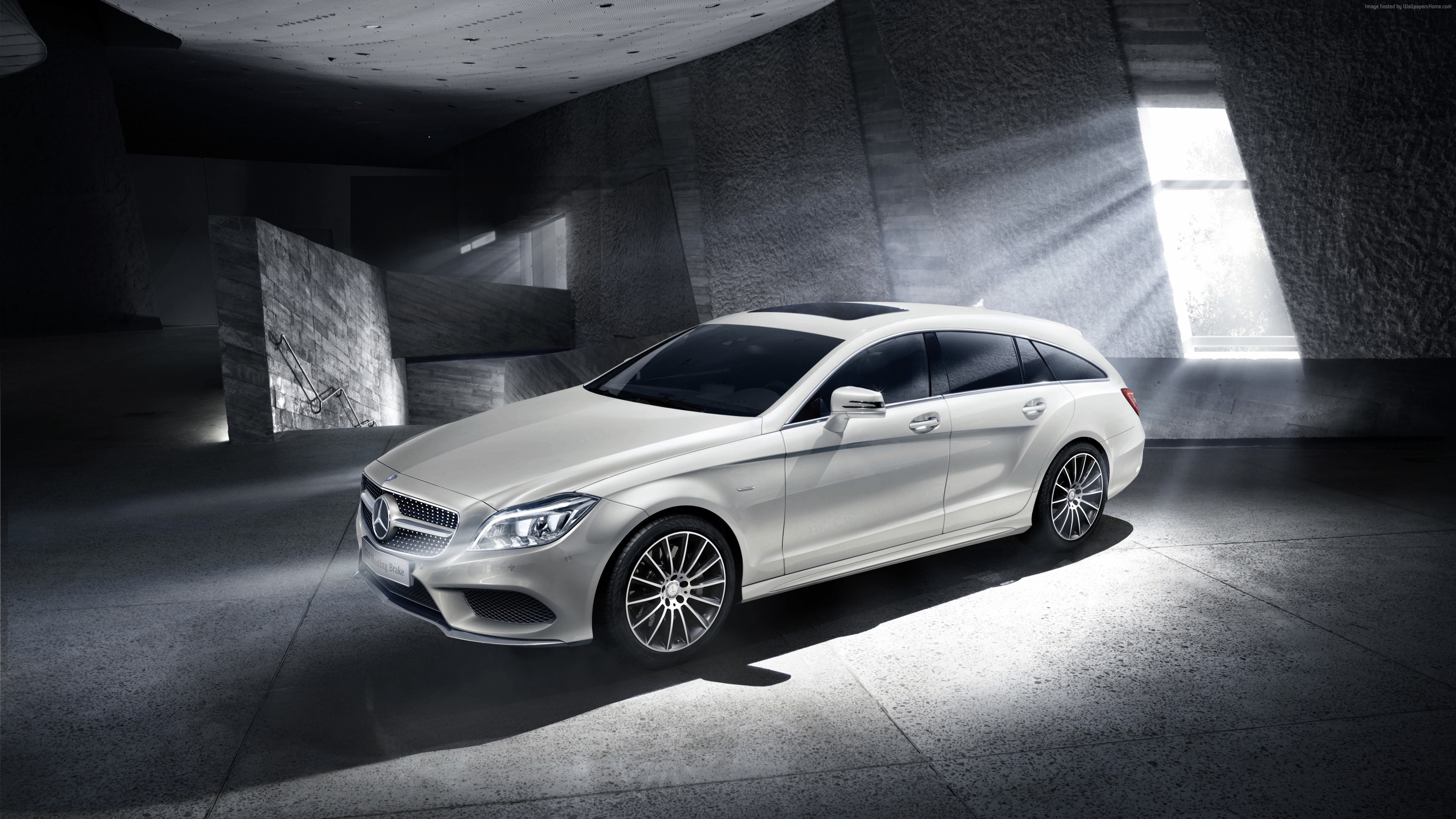 White Mercedes-Benz CLS Shooting Brake in concrete structure HD Wallpaper