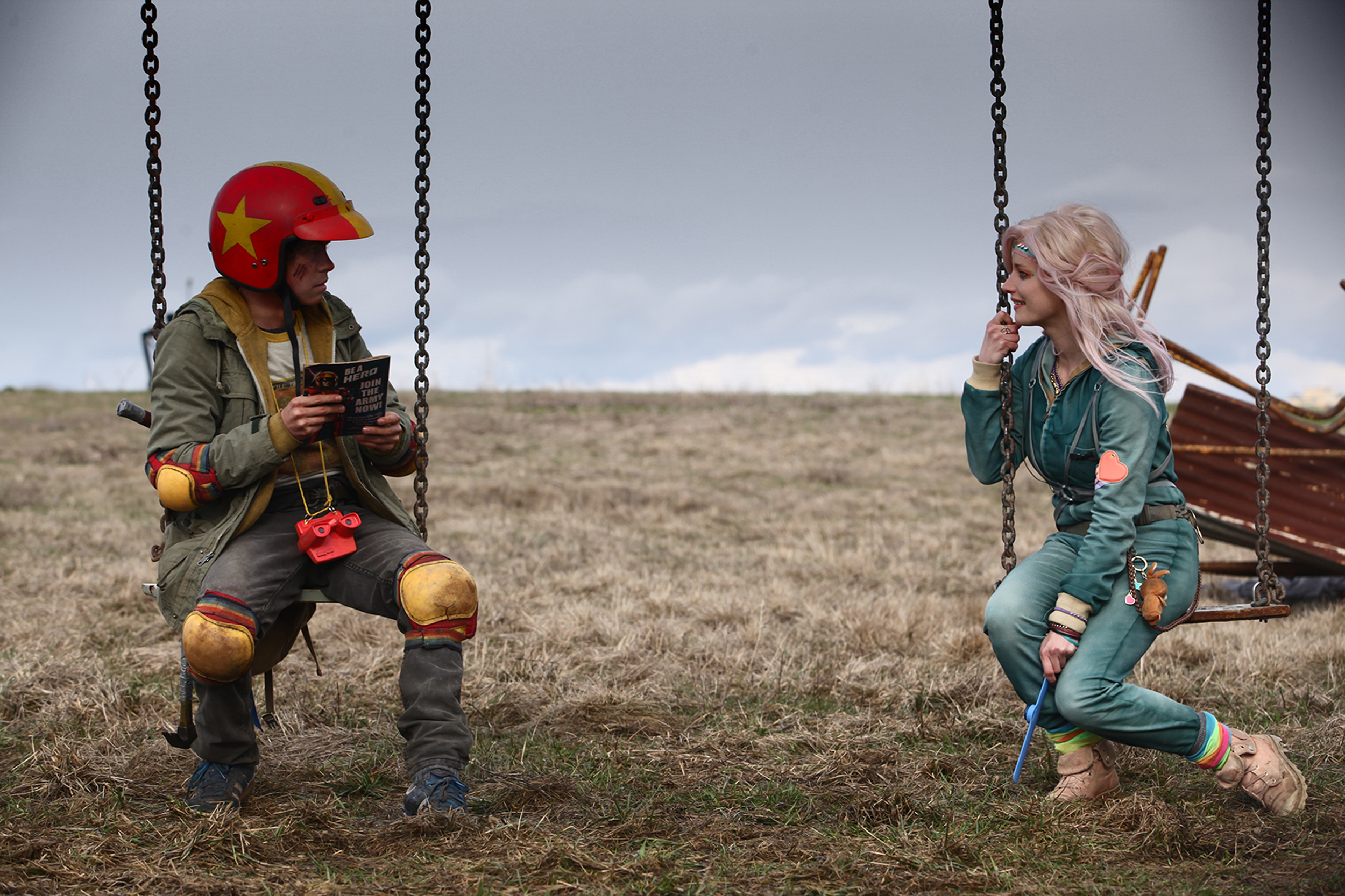 Kid and Apple from Turbo Kid on swings HD Wallpaper