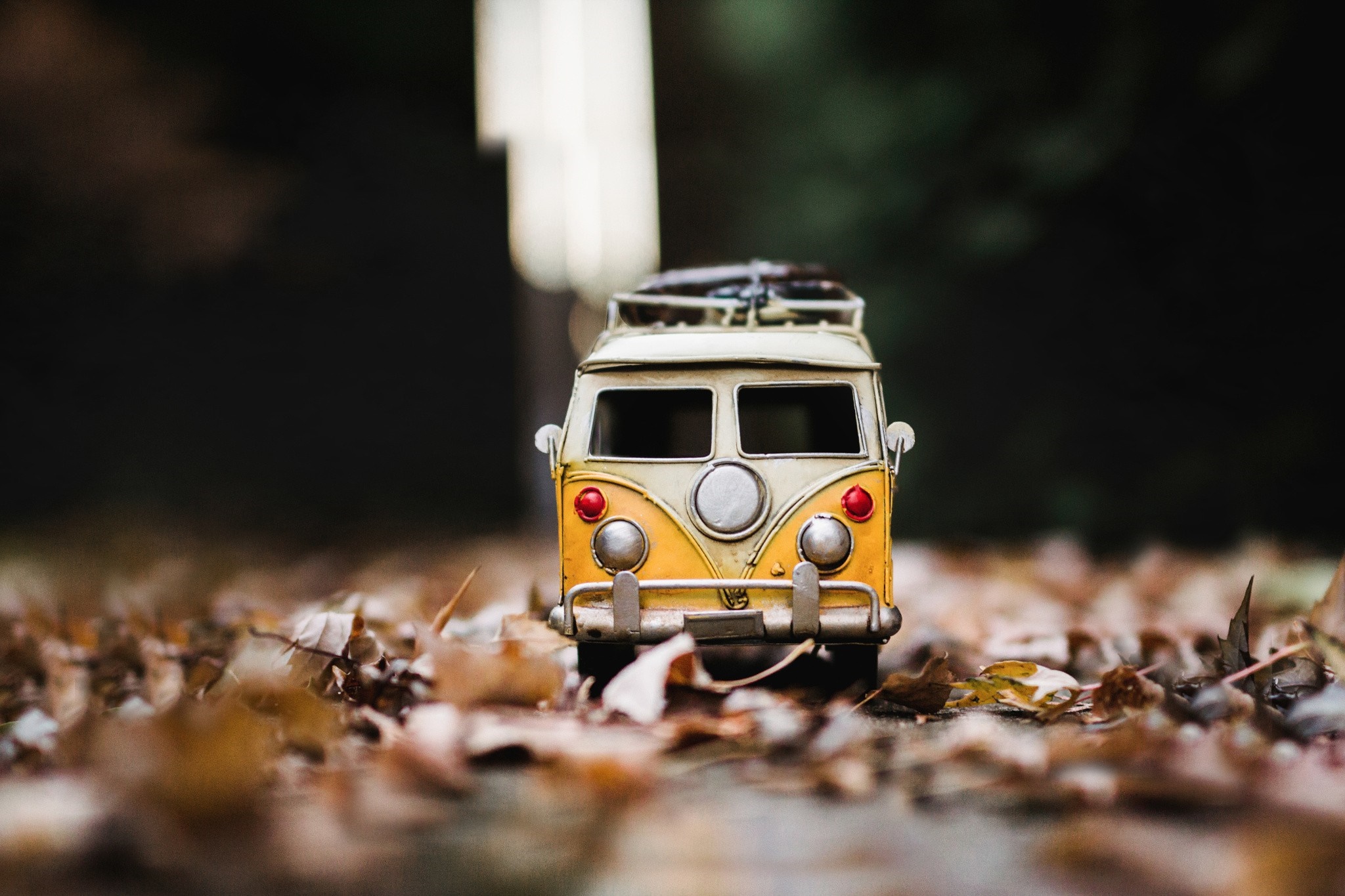 Toy Volkswagen Combi van on autumn leaves HD Wallpaper