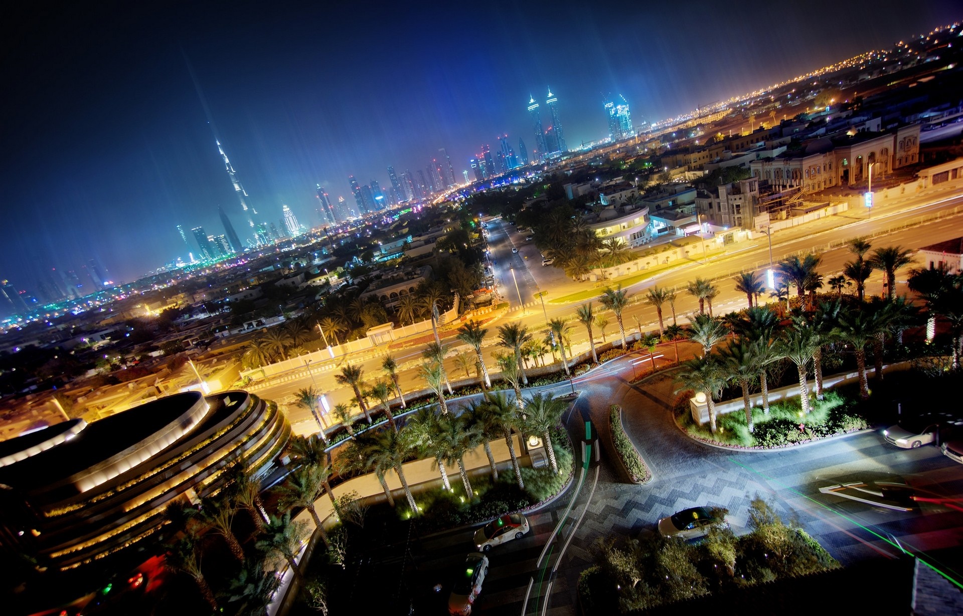 Dubai cityscape at night with Burj Khalifa HD Wallpaper