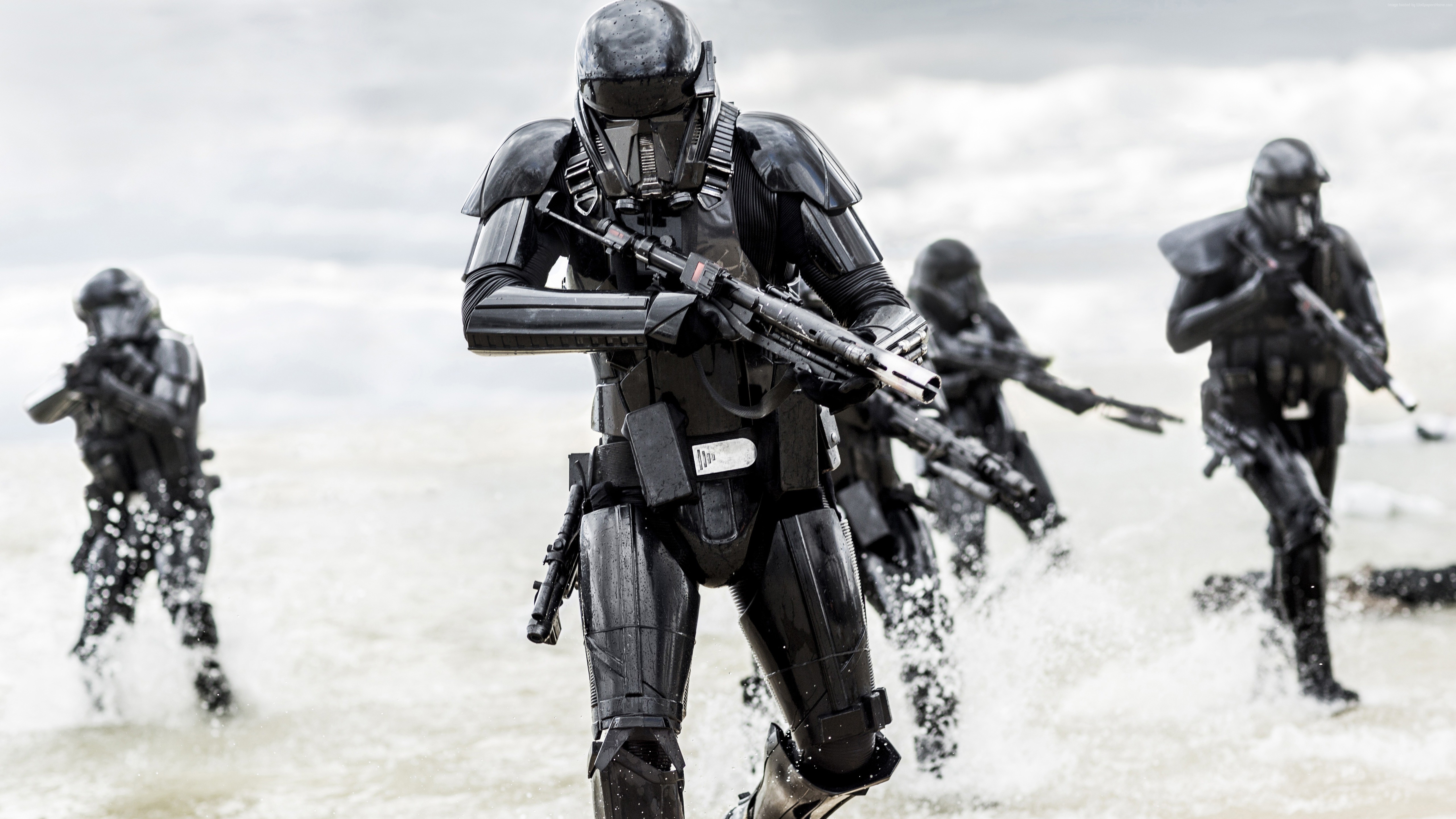 Stormtroopers from Rogue One: A Star Wars Story on a beach HD Wallpaper
