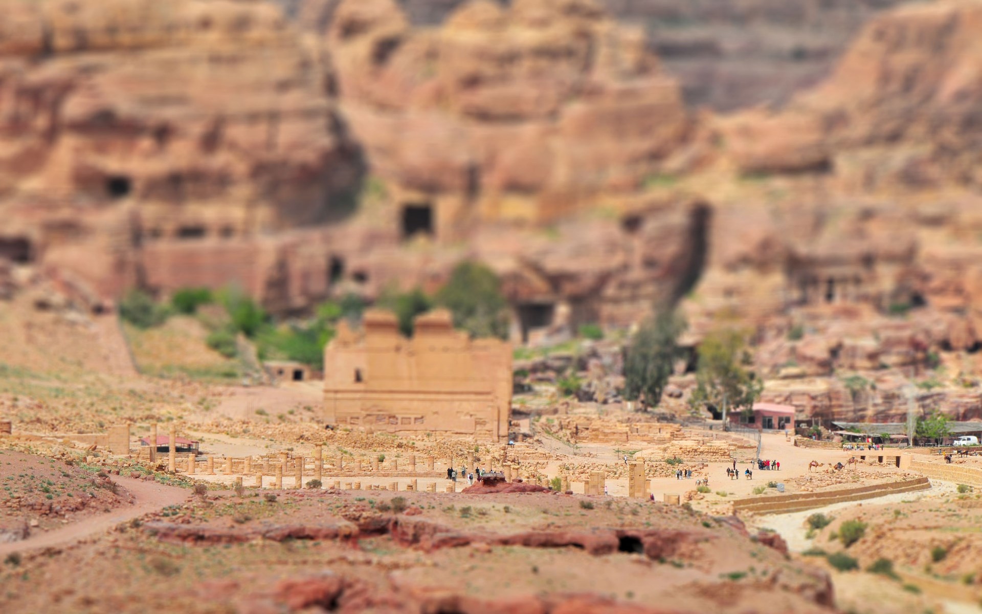Ancient ruins and sandstone cliffs in Petra, Jordan HD Wallpaper