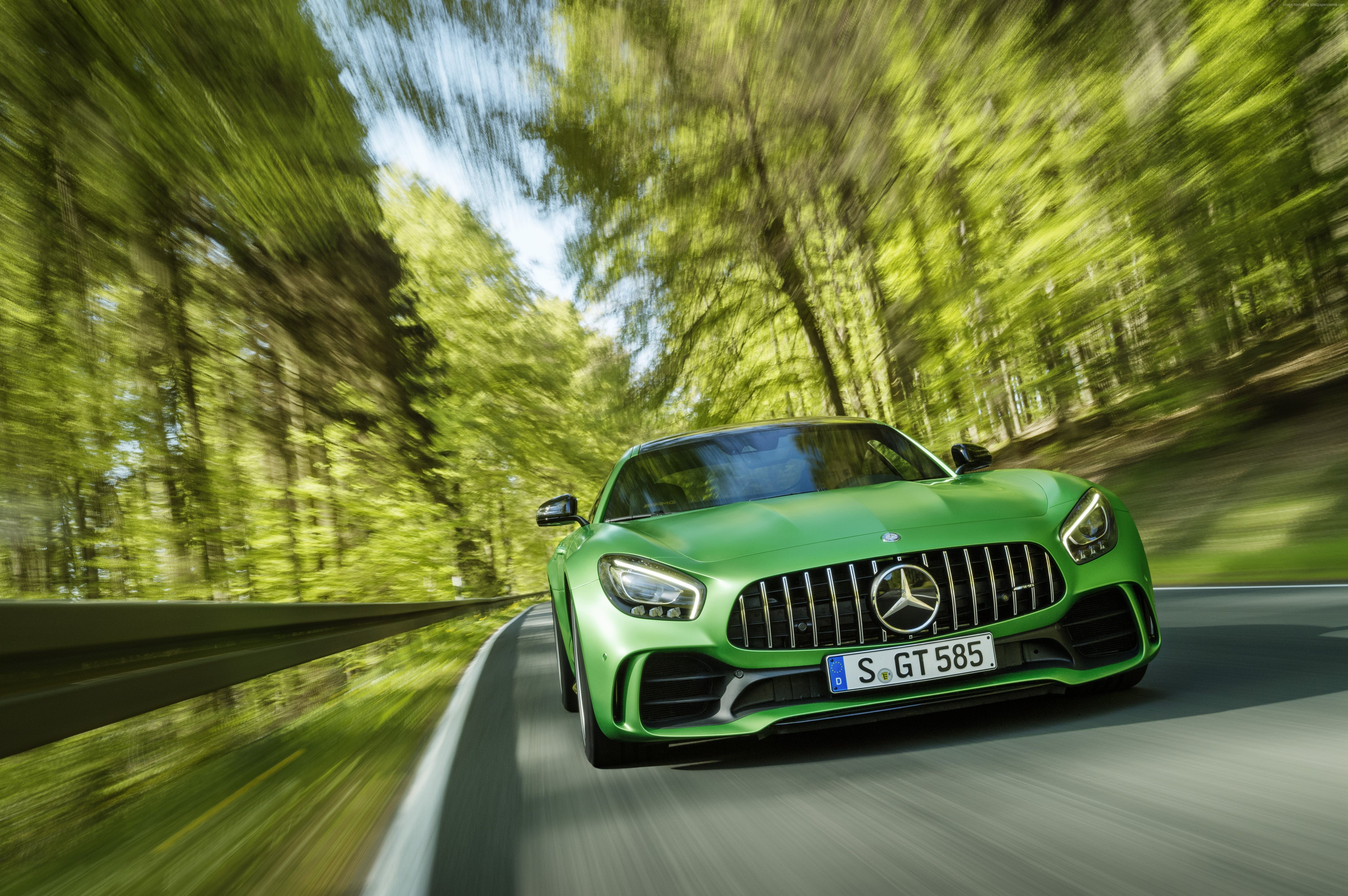 Green Mercedes-AMG GT R driving on a forest road HD Wallpaper