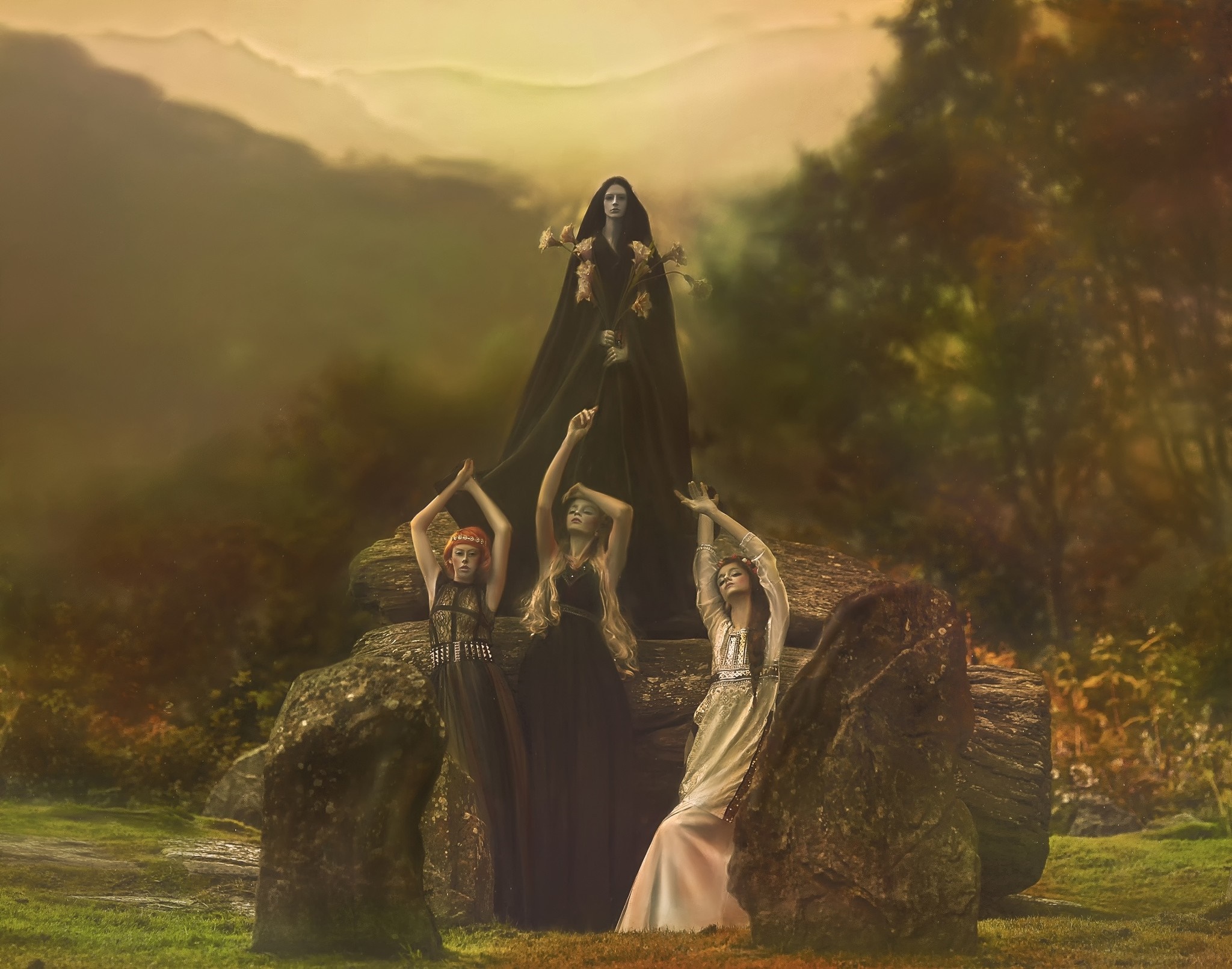 Four women in dark robes in a mystical landscape HD Wallpaper