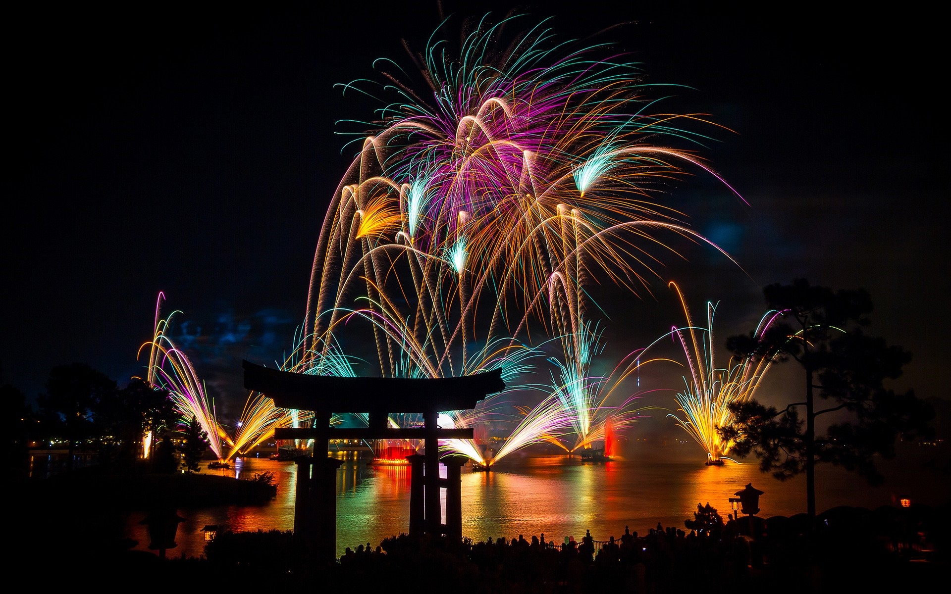 Fireworks over water with Japanese Torii gate HD Wallpaper