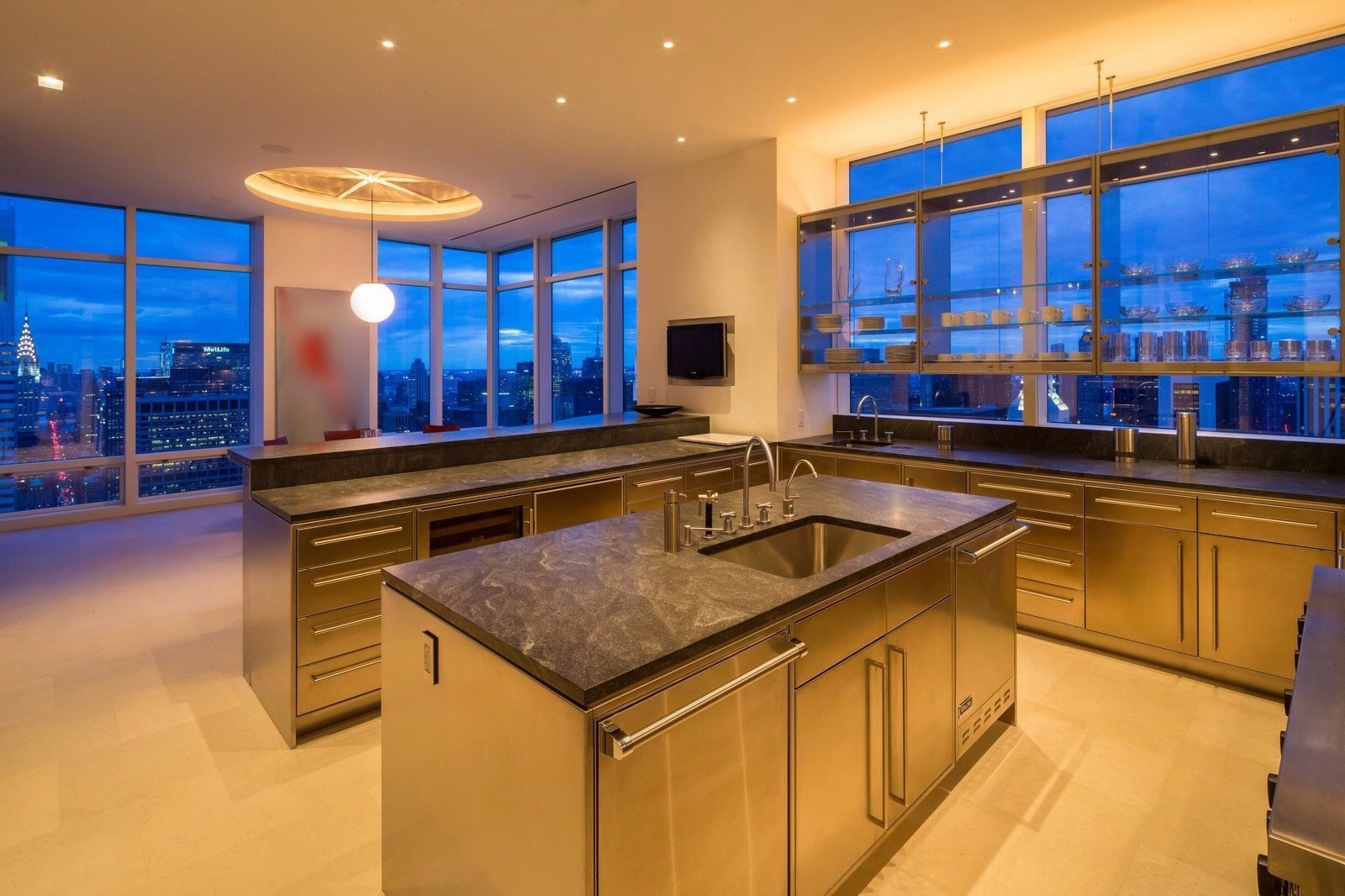 Modern kitchen with city view at night HD Wallpaper