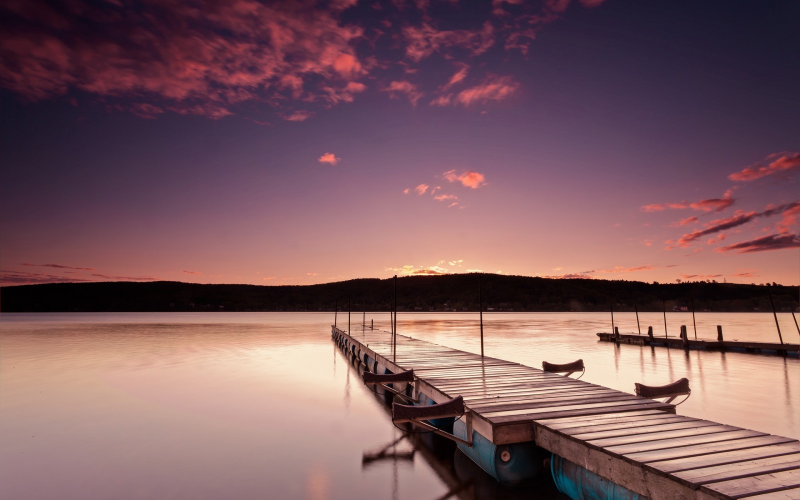 Wooden pier on a lake at sunset with pink clouds HD Wallpaper