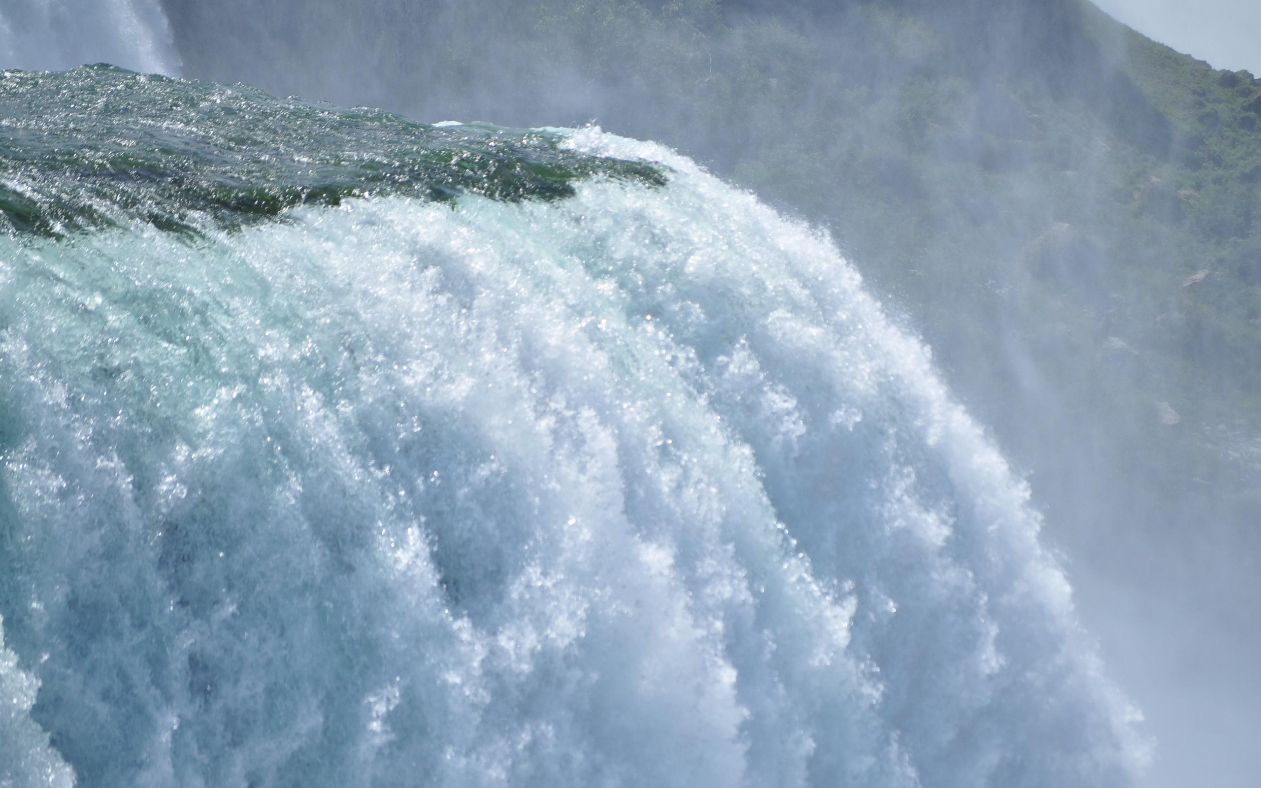 Close-up of a powerful waterfall cascading down HD Wallpaper