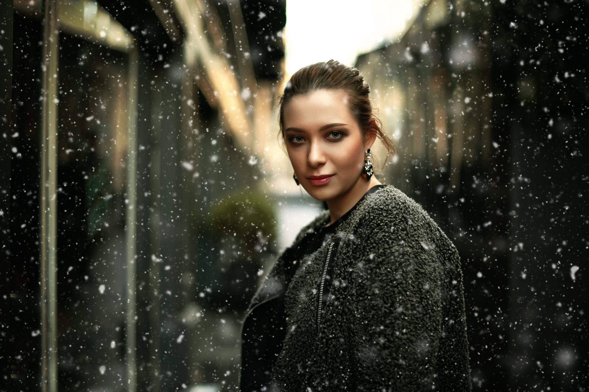 Woman in a fuzzy coat in the snow HD Wallpaper