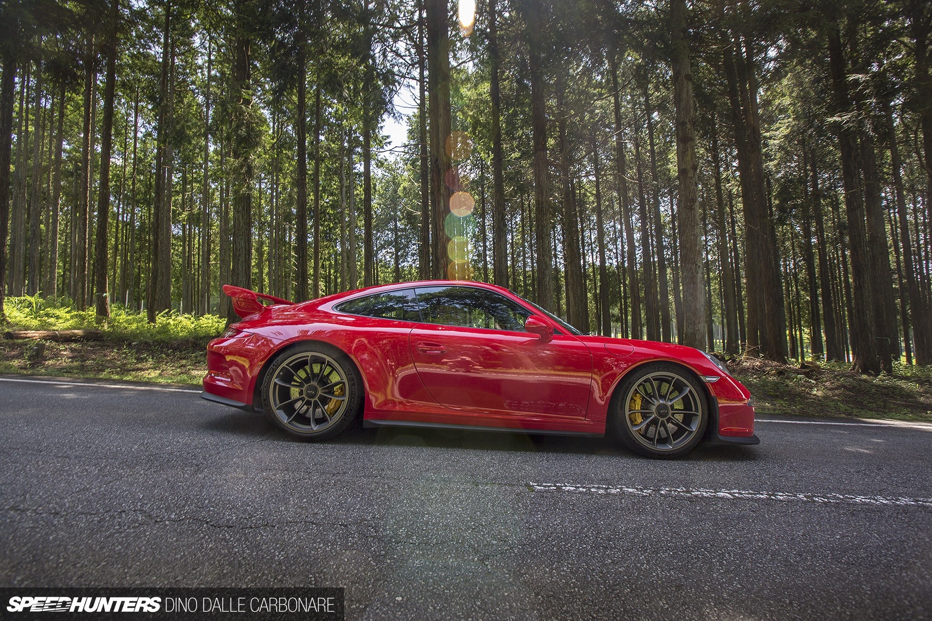Red Porsche 911 GT3 on a Forest Road HD Wallpaper