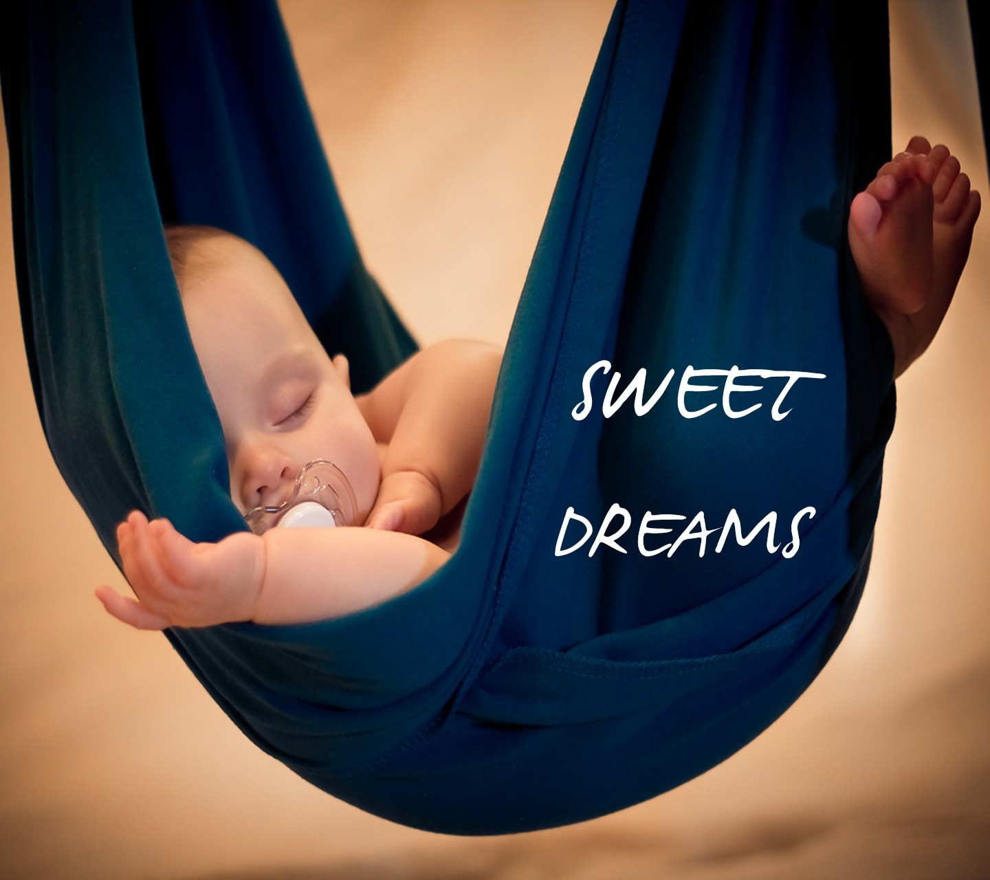 Baby sleeping in a hammock with text HD Wallpaper