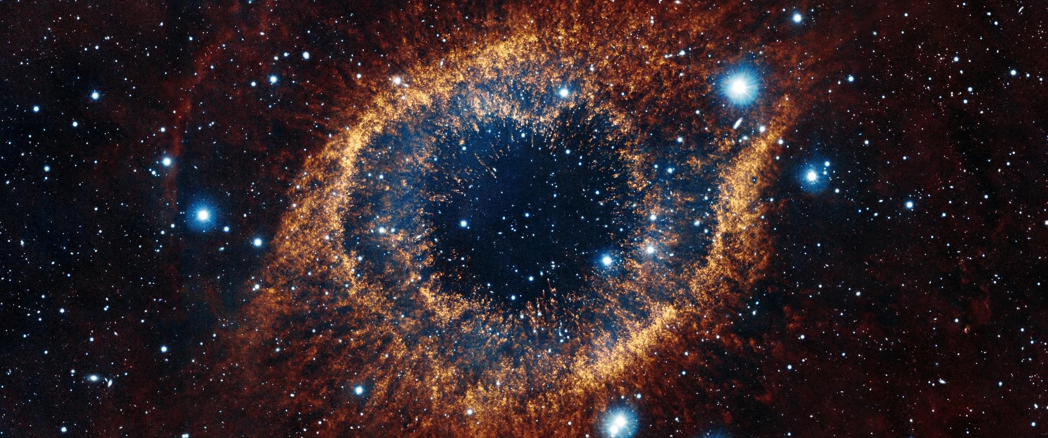 The Helix Nebula in deep space HD Wallpaper