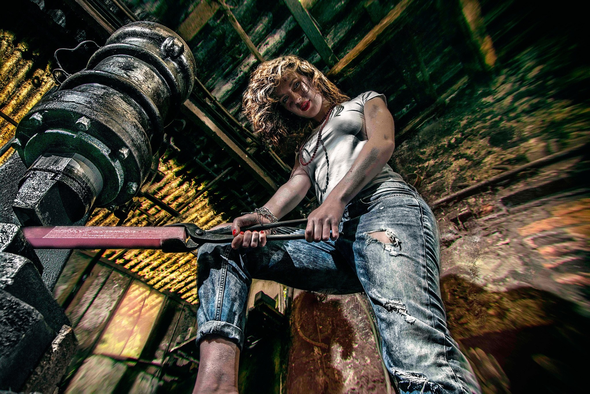 Woman working with a large industrial machine HD Wallpaper