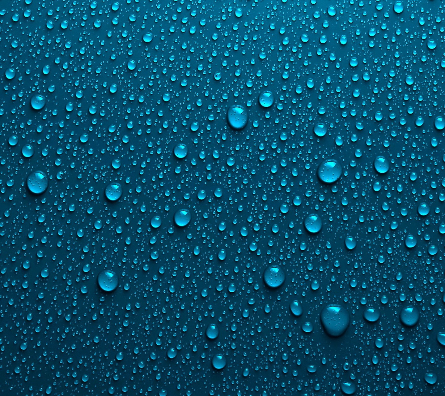 Blue water drops on a dark blue surface HD Wallpaper