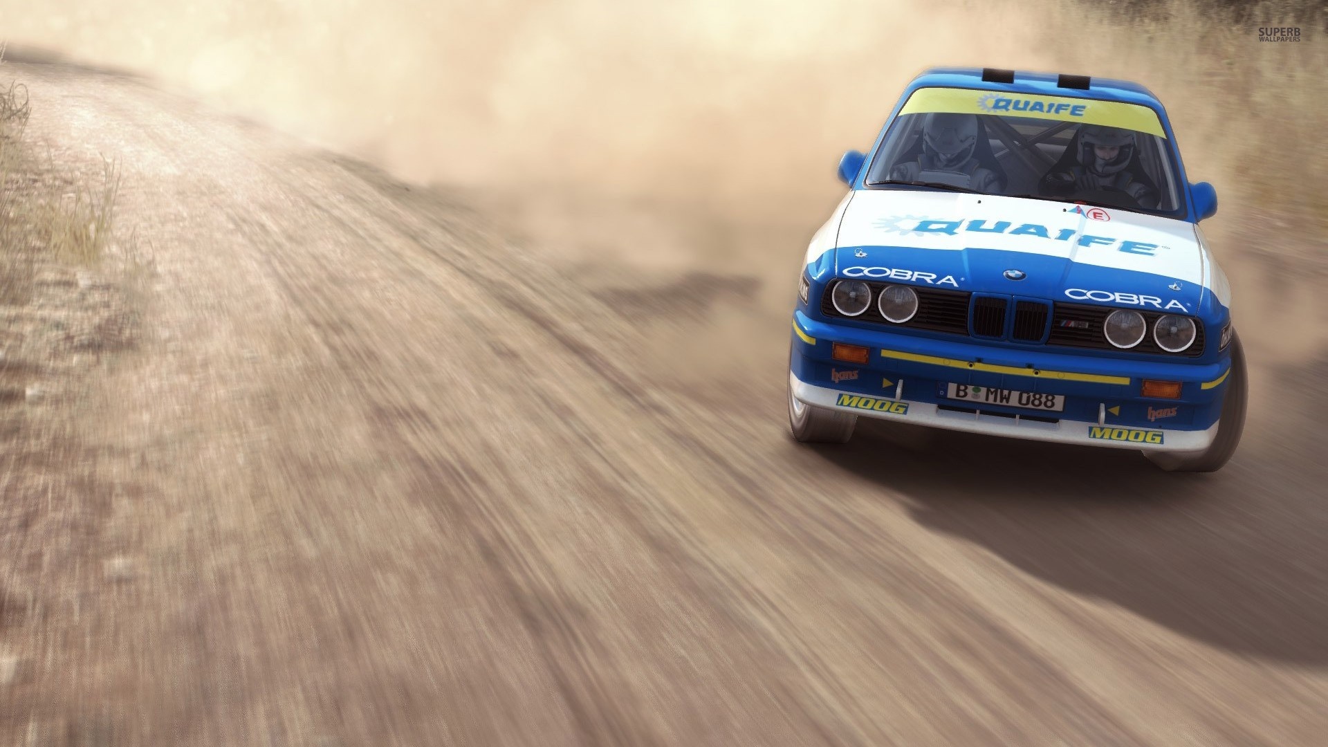 BMW M3 E30 rally car on a dirt road HD Wallpaper