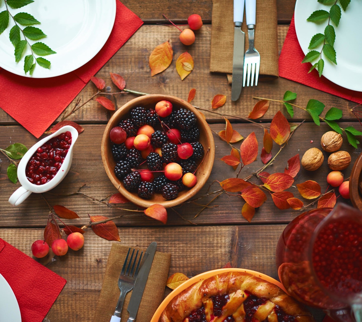 Thanksgiving table setting with berries and pie HD Wallpaper
