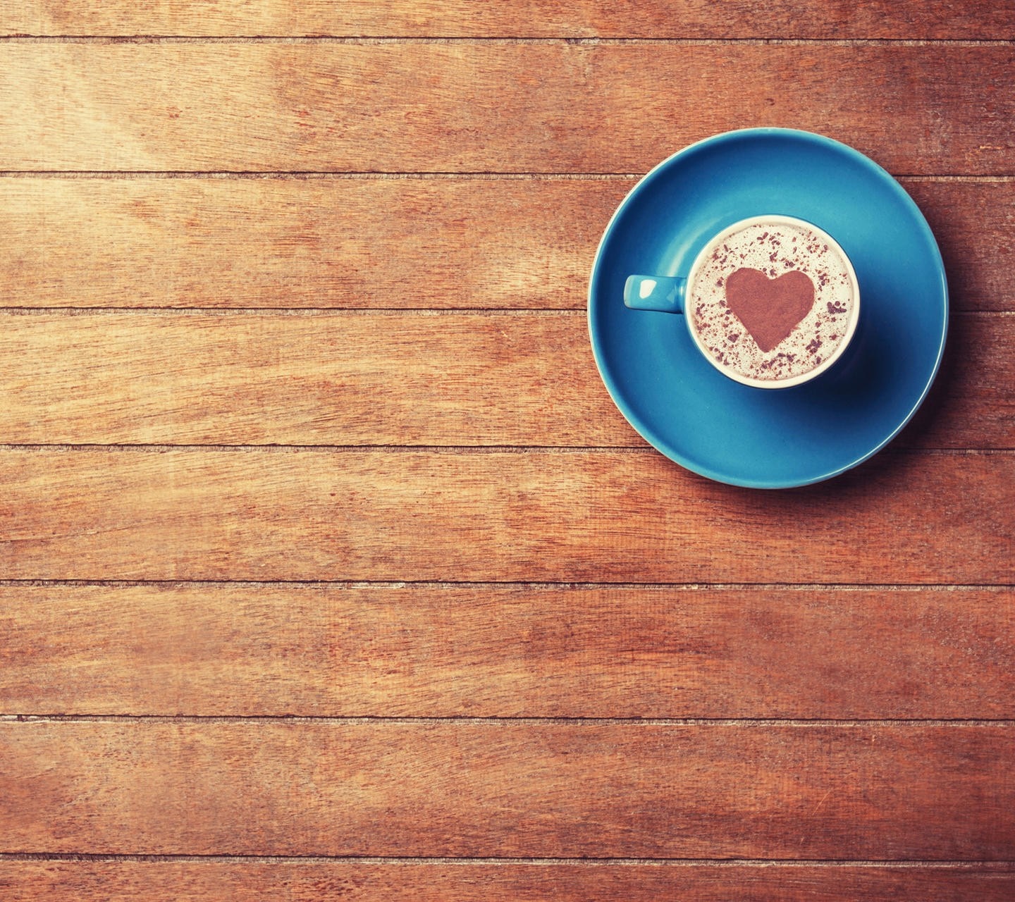 Cup of coffee with heart on wooden table HD Wallpaper