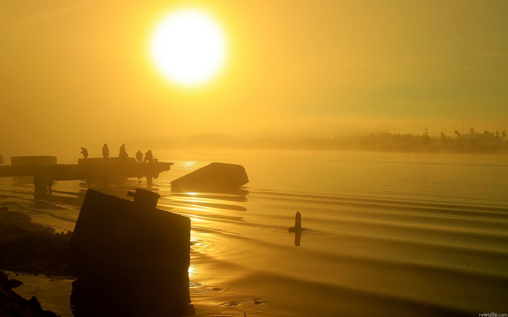 Fishermen on a pier at sunrise over the ocean HD Wallpaper