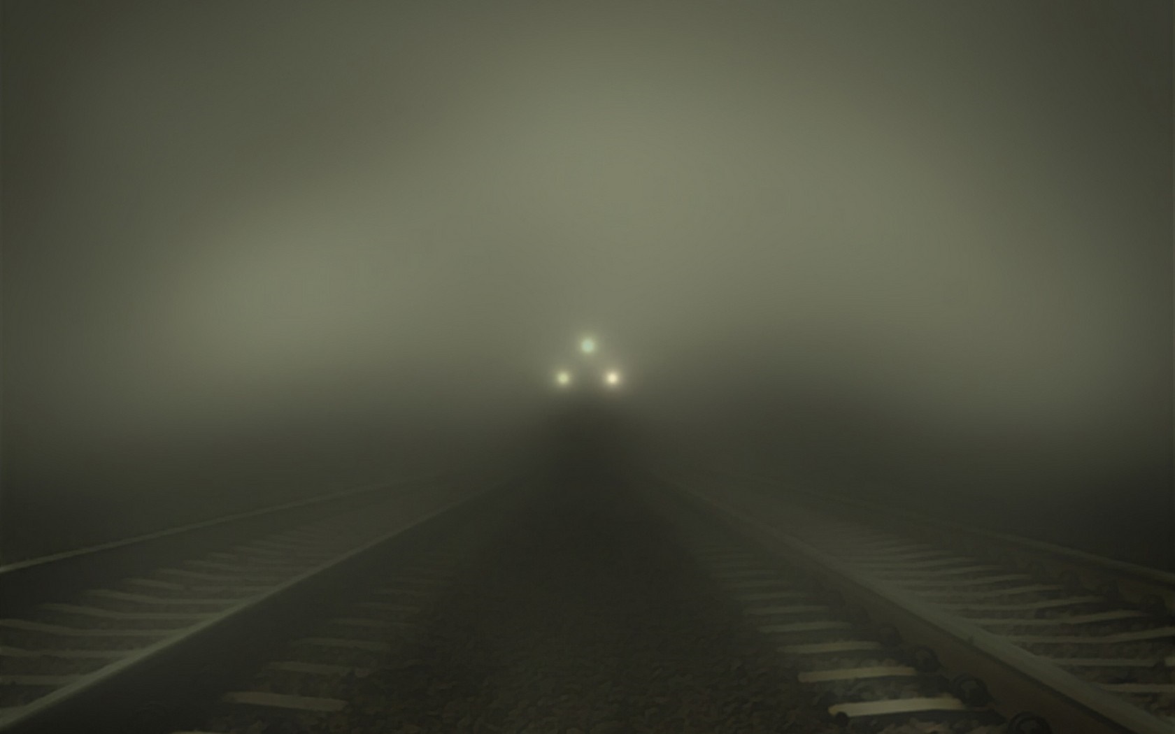 Train approaching through thick fog at night HD Wallpaper