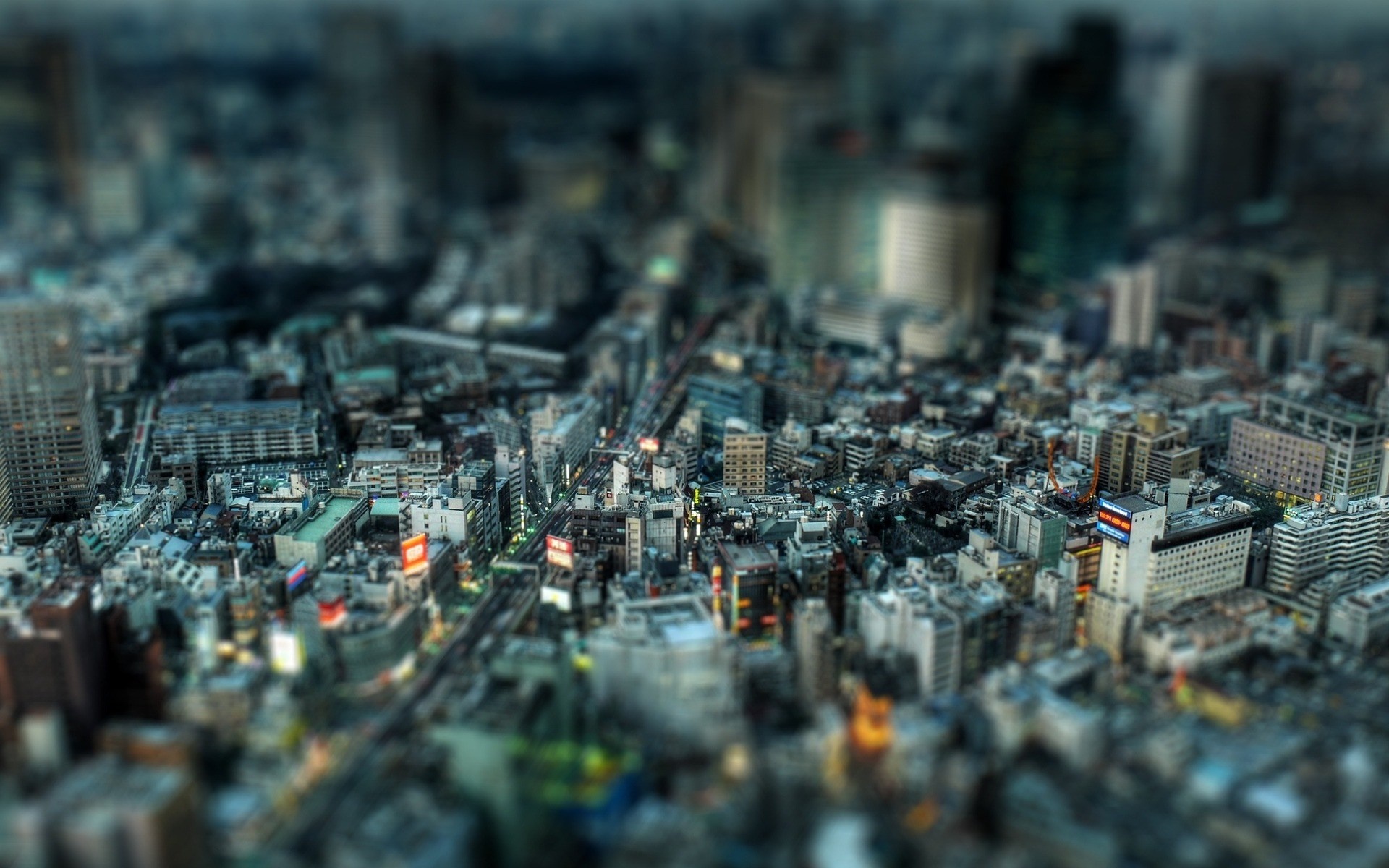 Tilt-shift aerial photography of a dense Japanese cityscape HD Wallpaper