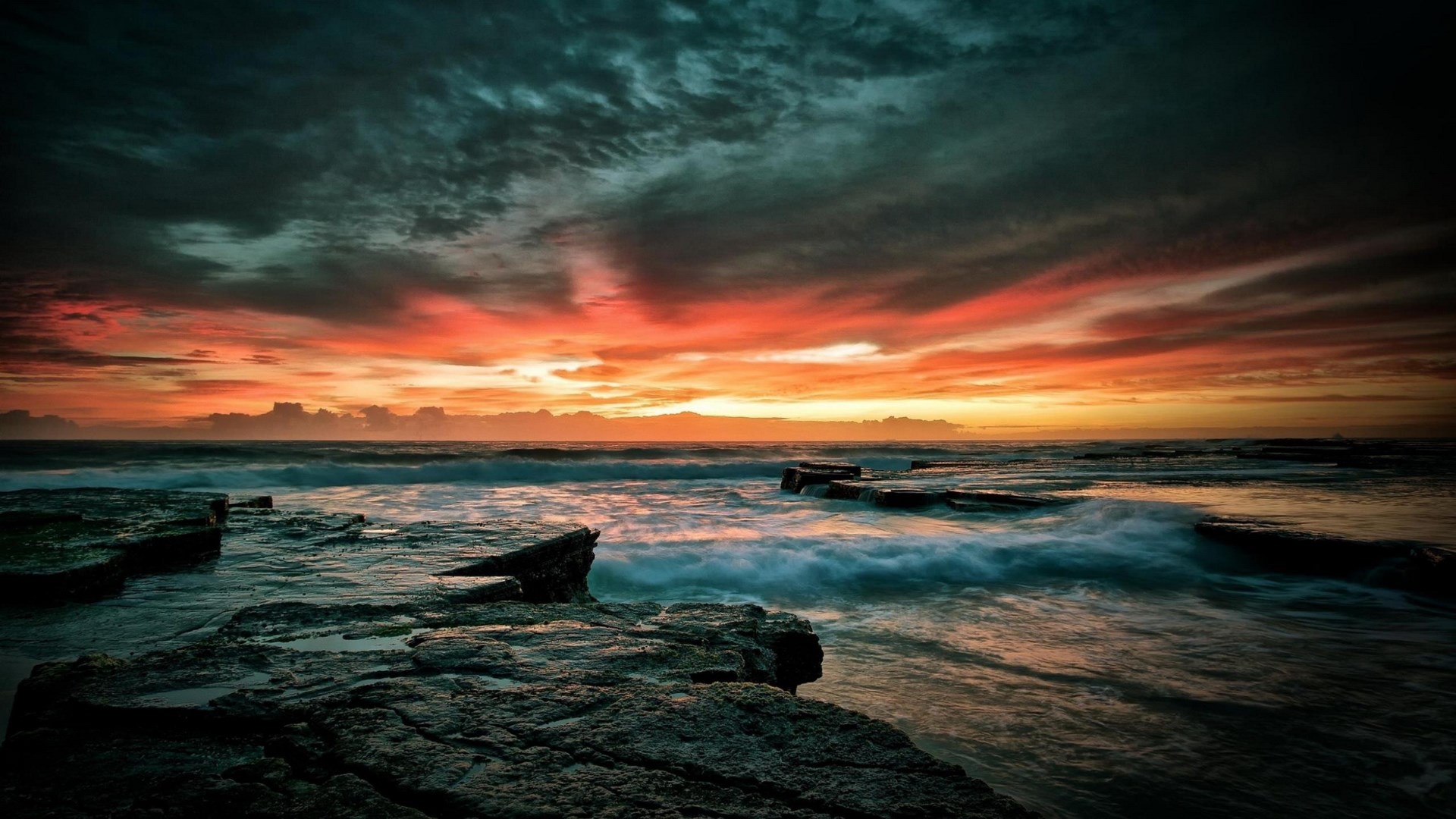 Dramatic Sunset Over Rocky Coastline HD Wallpaper