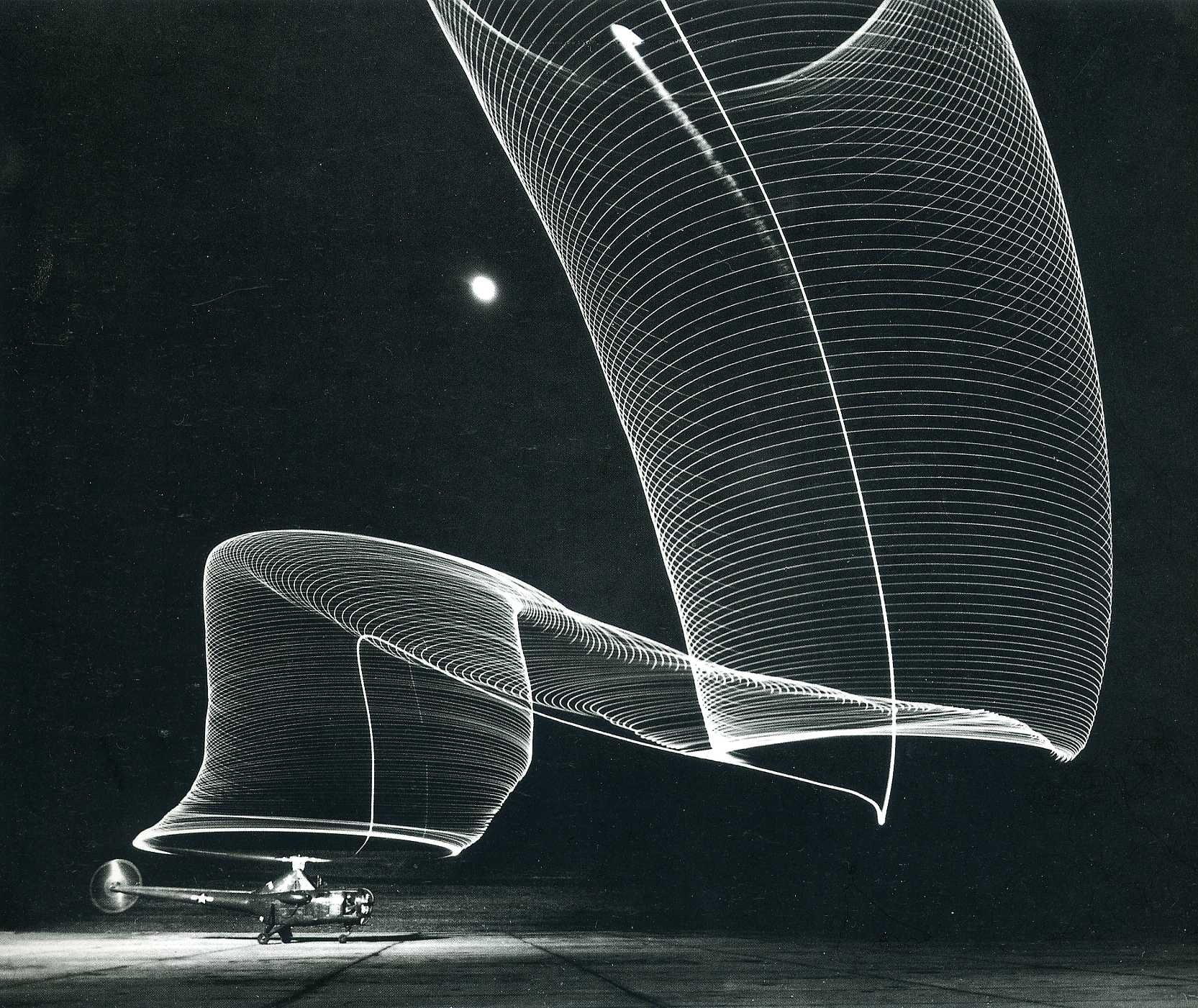 Helicopter light trails in monochrome HD Wallpaper