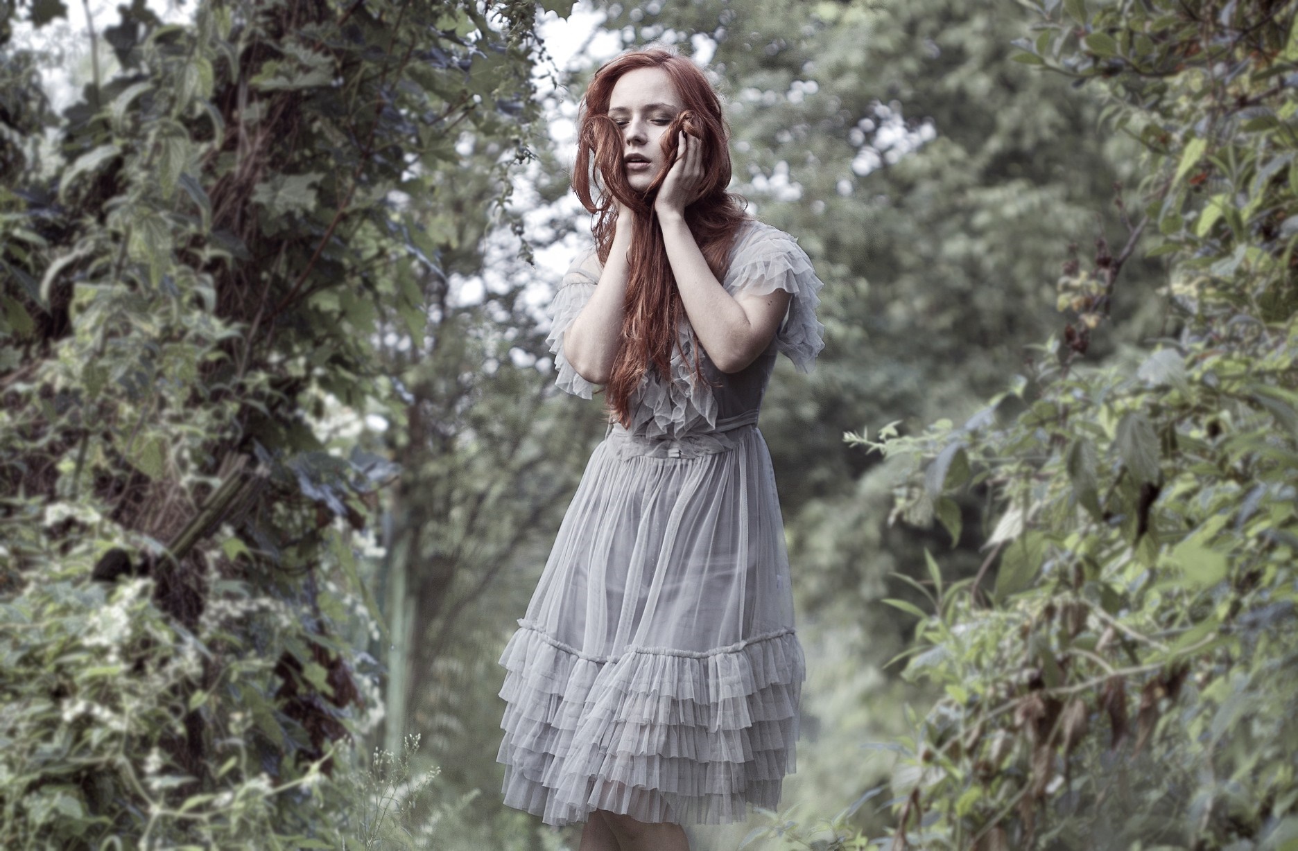Redhead woman in a grey dress in a forest HD Wallpaper