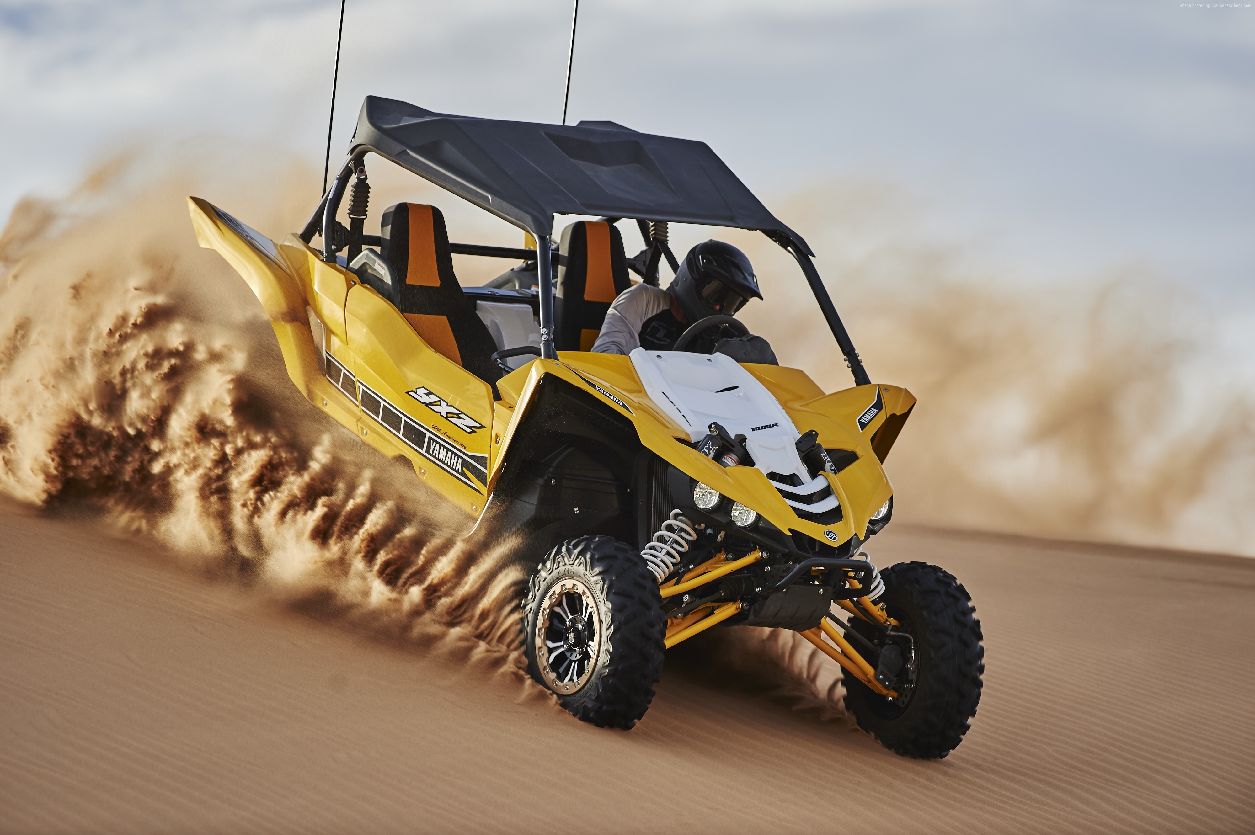 Yellow Yamaha YXZ1000R SE driving through sand HD Wallpaper