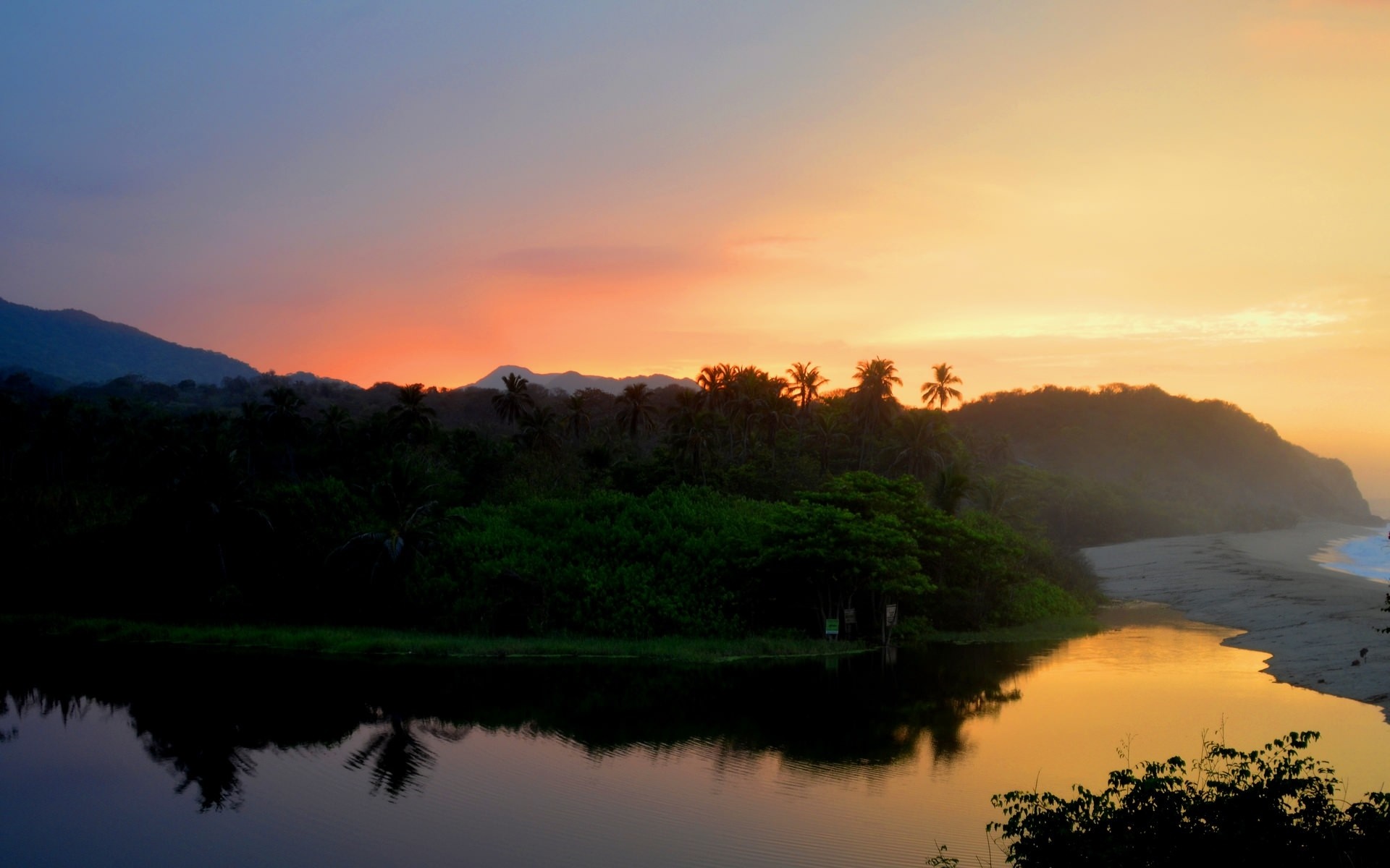 Sunset over a tropical river and coastline HD Wallpaper