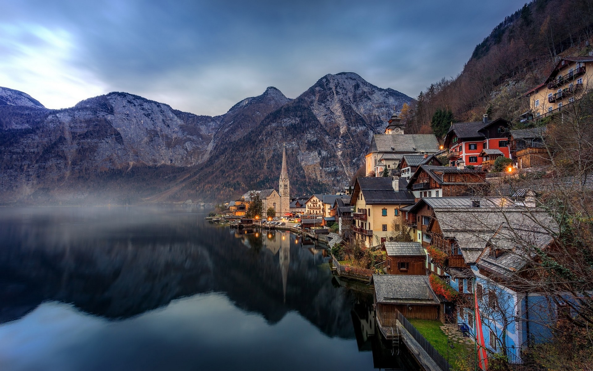 Hallstatt village on a lake with mountains HD Wallpaper