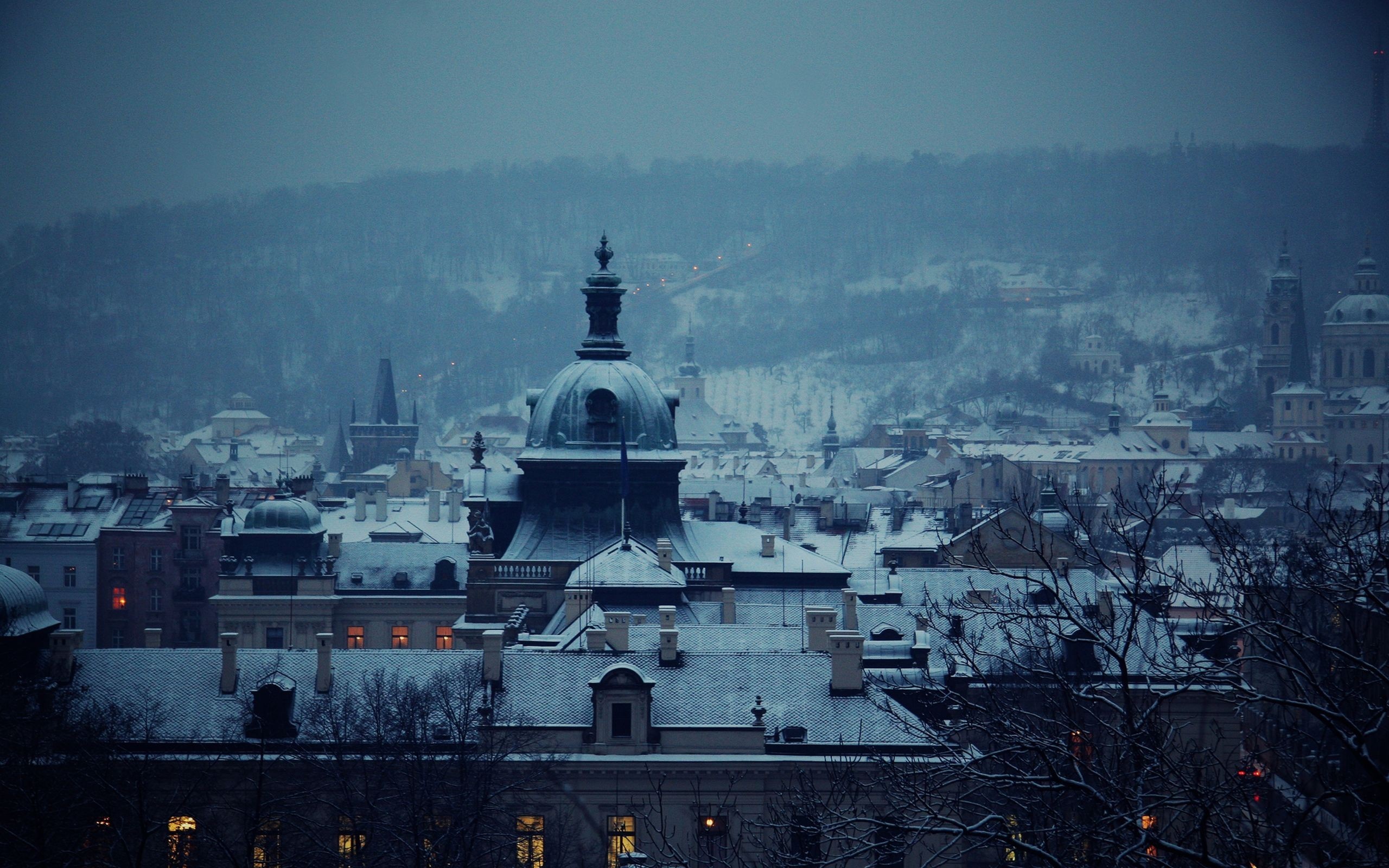Snowy cityscape with domes and towers at dusk HD Wallpaper