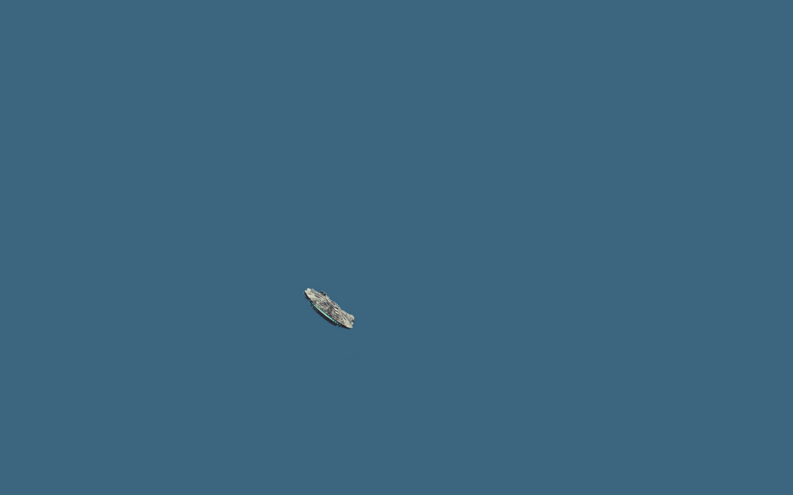 Millennium Falcon spaceship in a blue sky HD Wallpaper