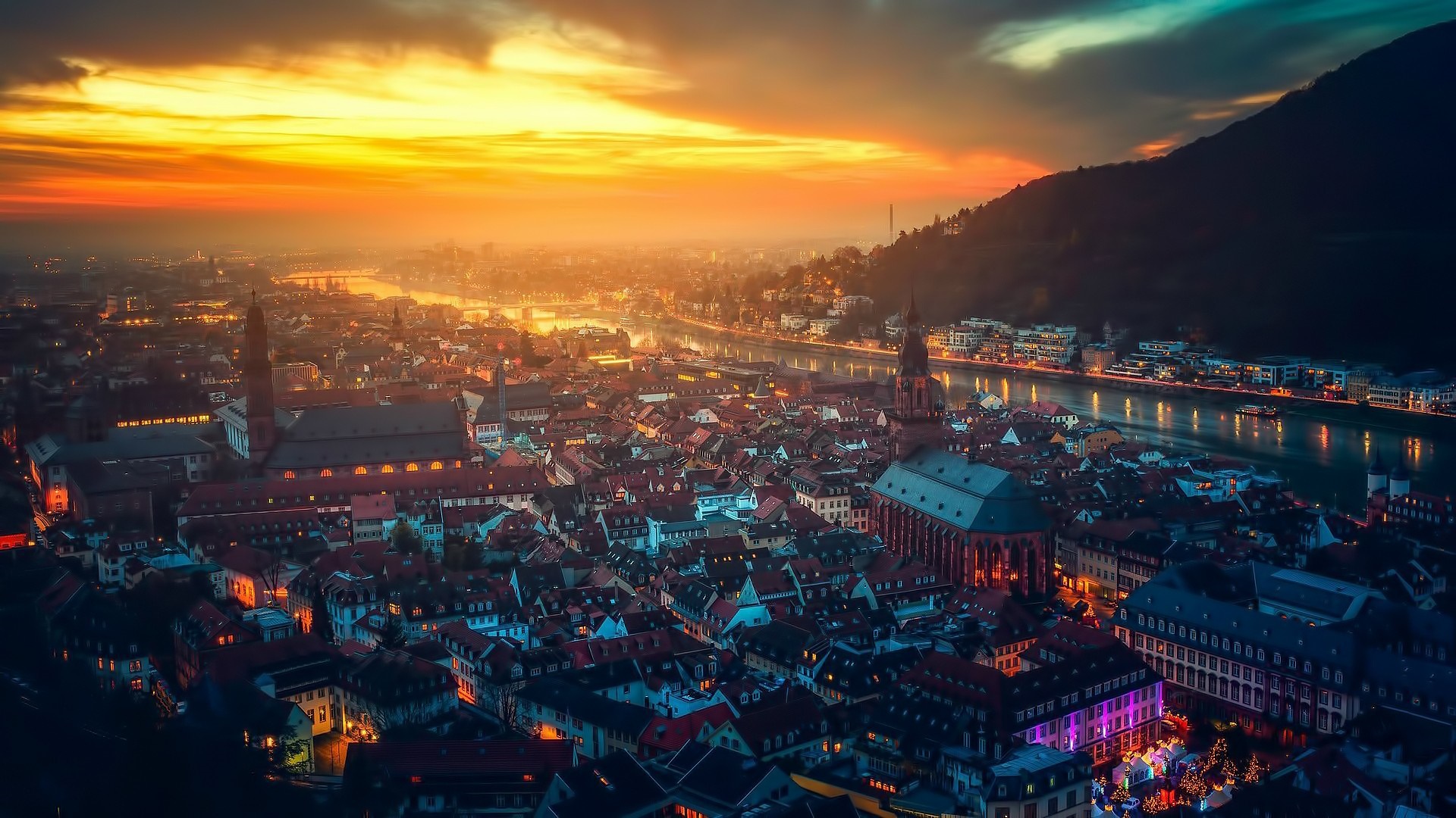 Heidelberg cityscape at sunset with river and mountains HD Wallpaper