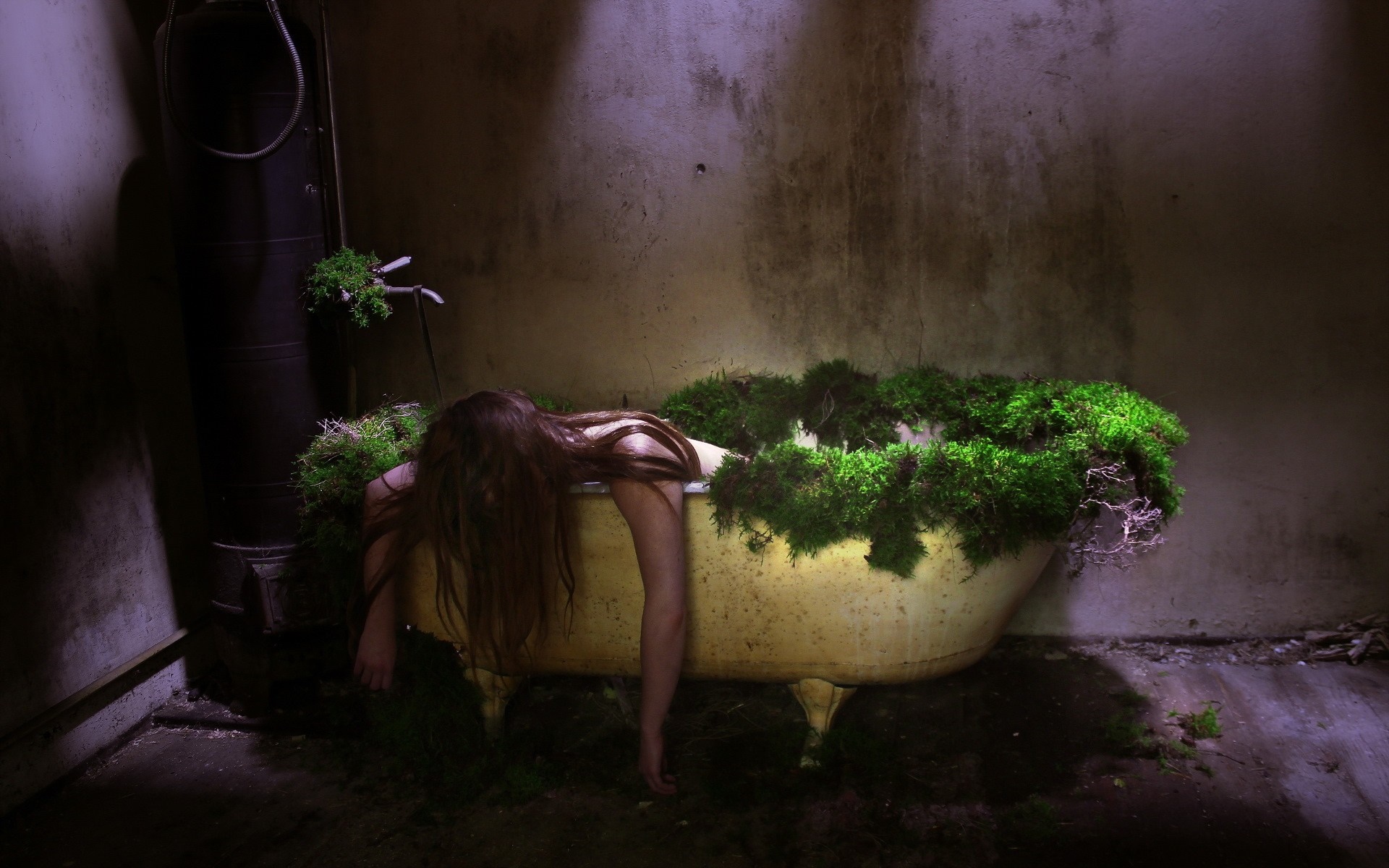 Woman in moss-covered bathtub HD Wallpaper