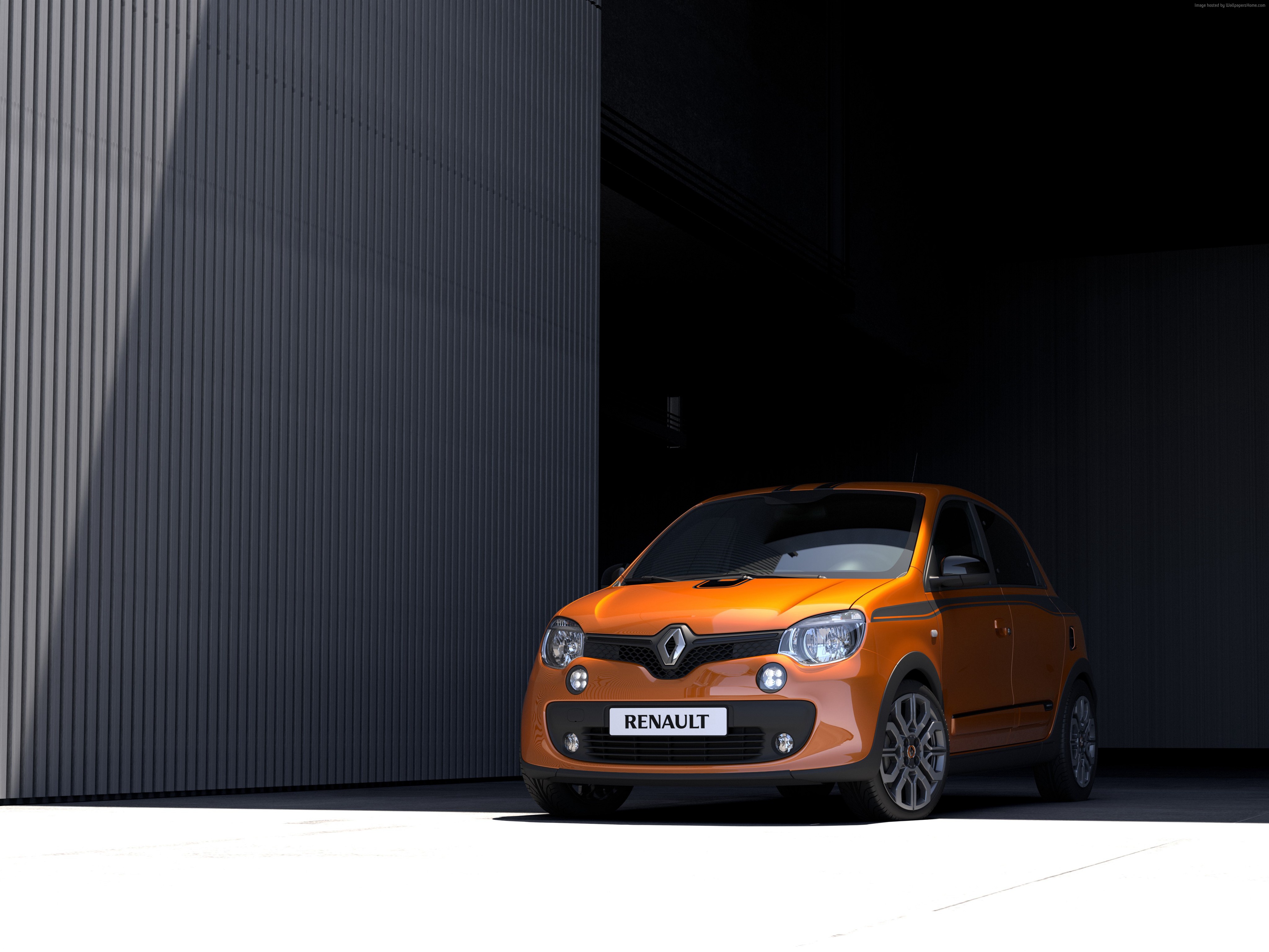Orange Renault Twingo GT parked in a modern garage HD Wallpaper