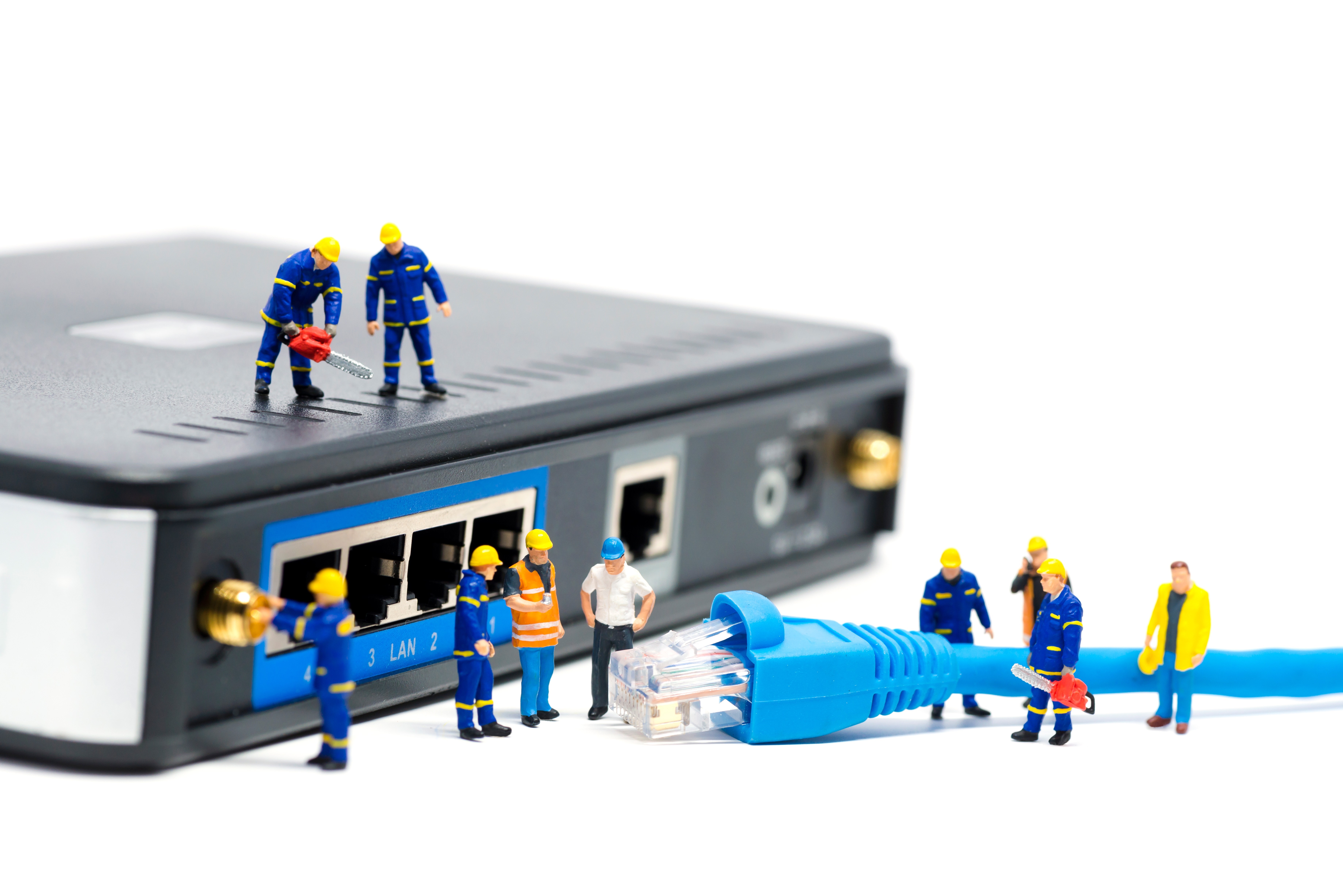 Miniature workers repairing a router with a network cable HD Wallpaper