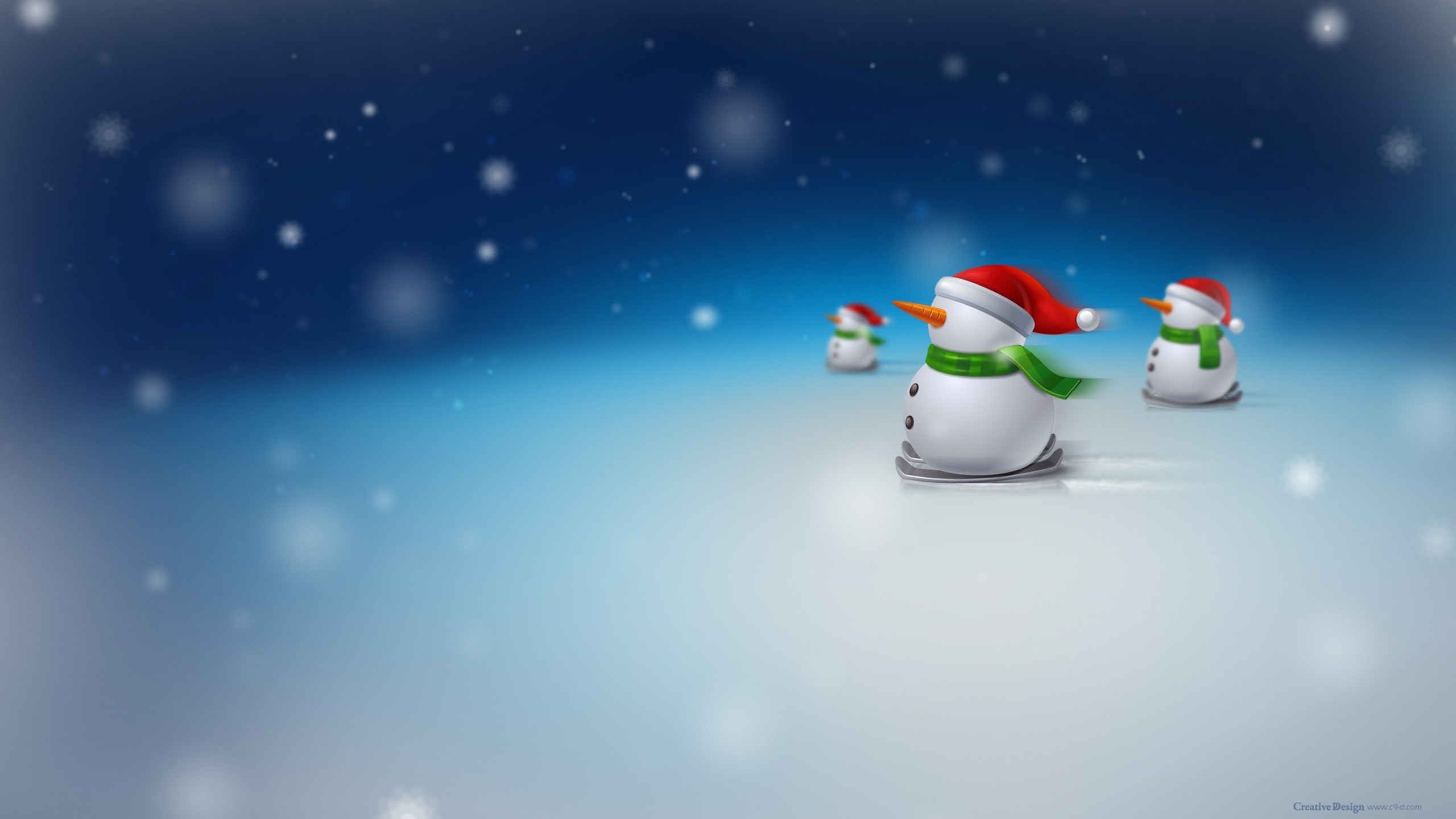 Snowmen skiing in a snowy landscape HD Wallpaper