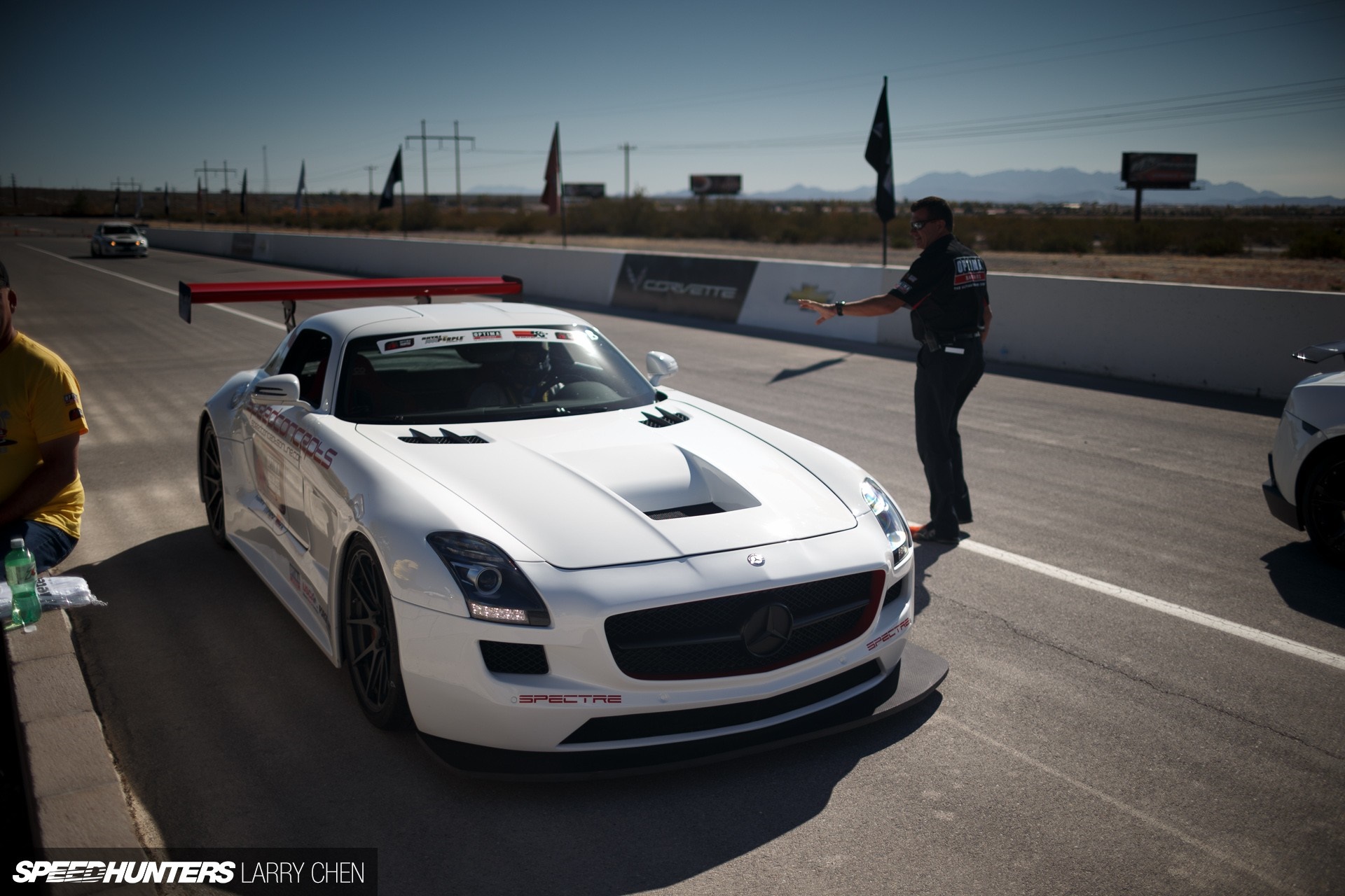 White Mercedes-Benz SLS AMG on a Race Track HD Wallpaper