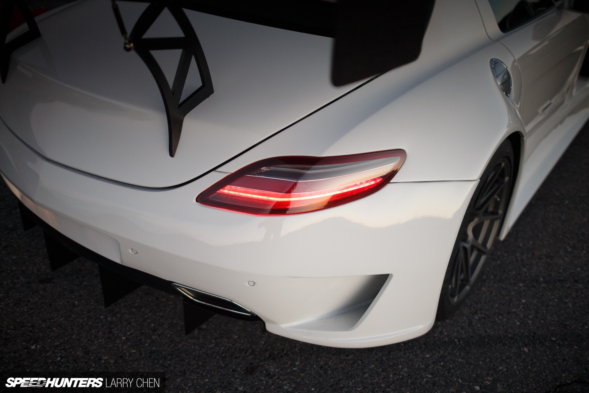 White Mercedes-Benz SLS AMG rear view HD Wallpaper