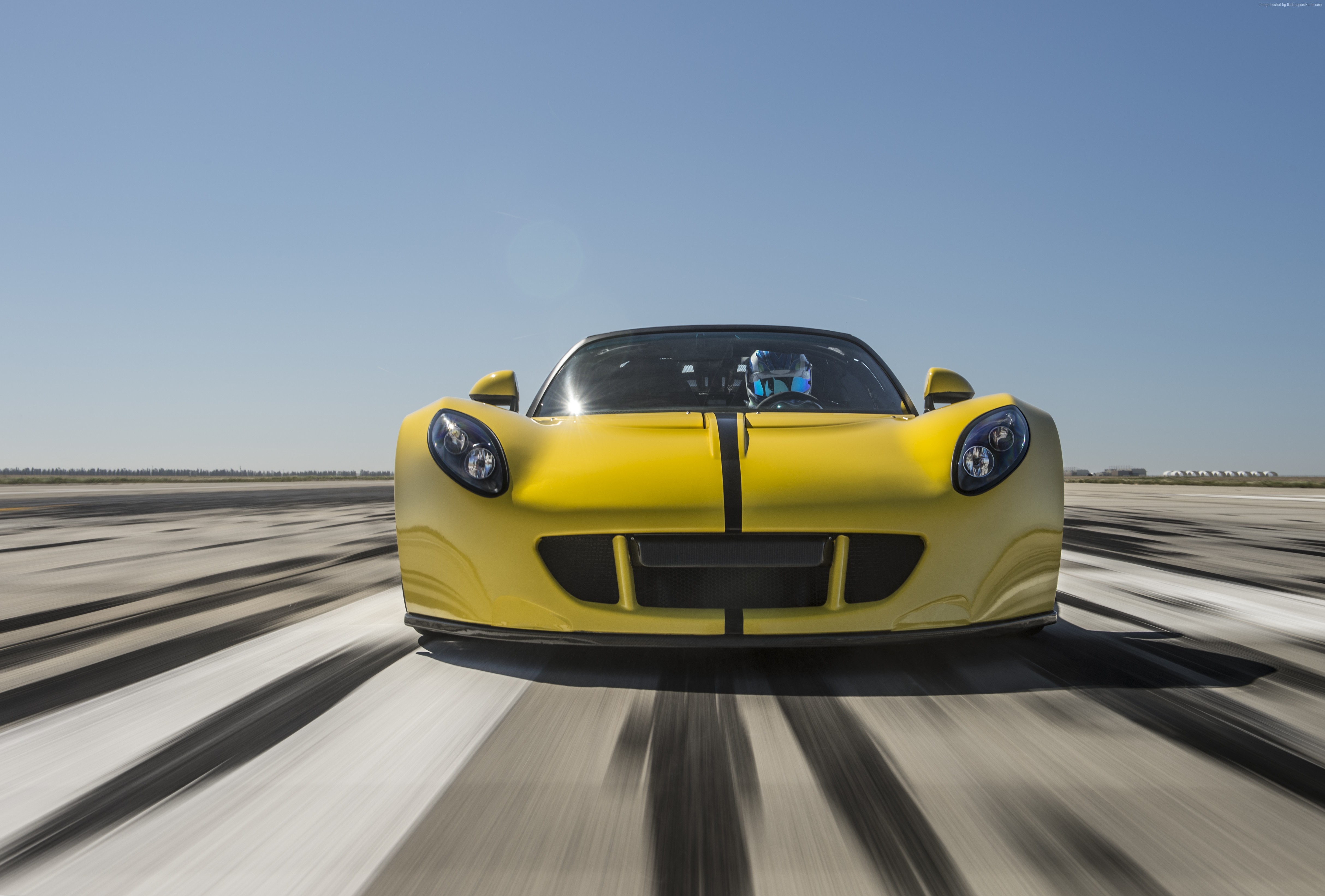 Yellow Hennessey Venom GT Spyder racing on a track HD Wallpaper