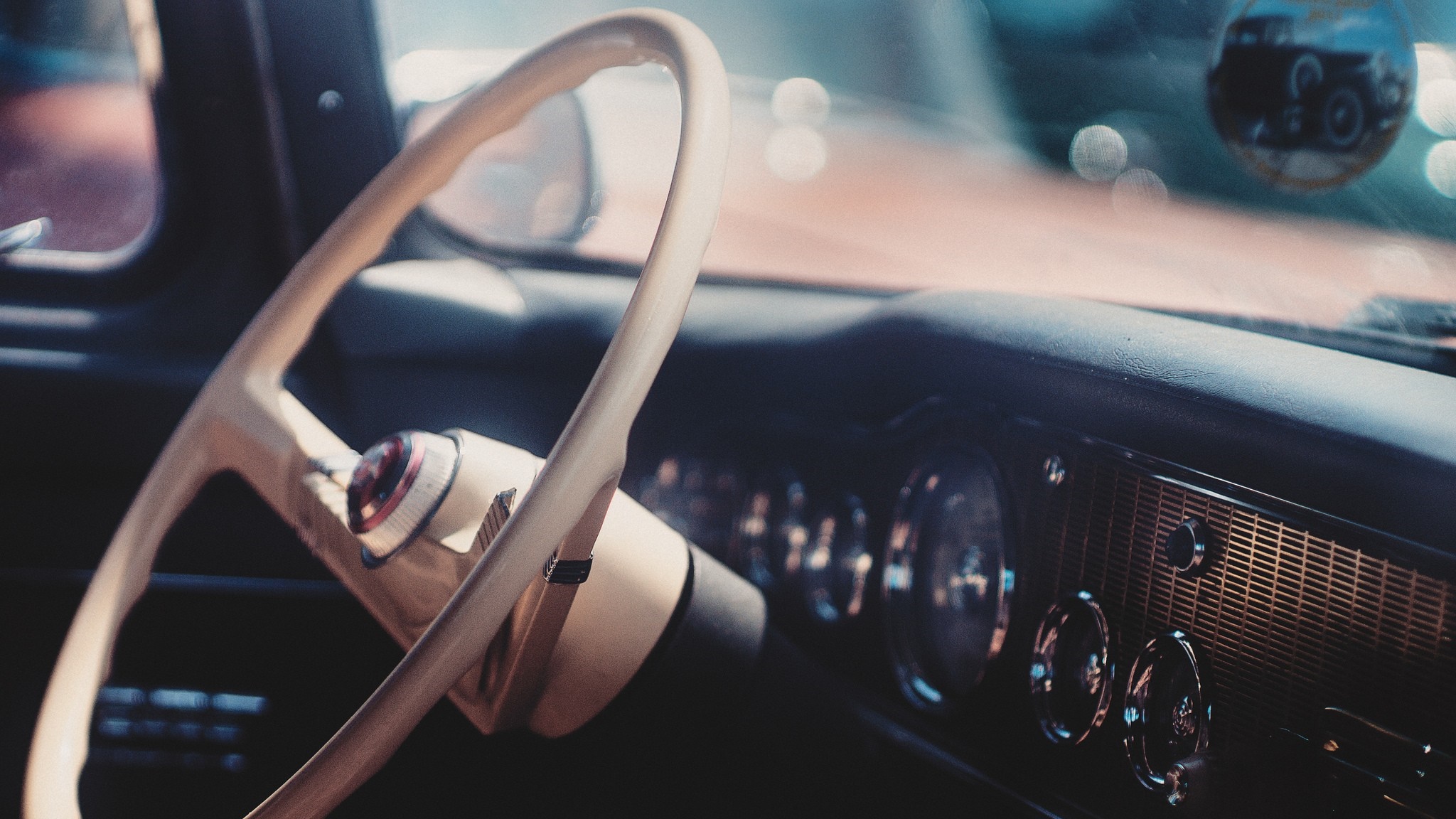 Vintage car interior with steering wheel and dashboard HD Wallpaper