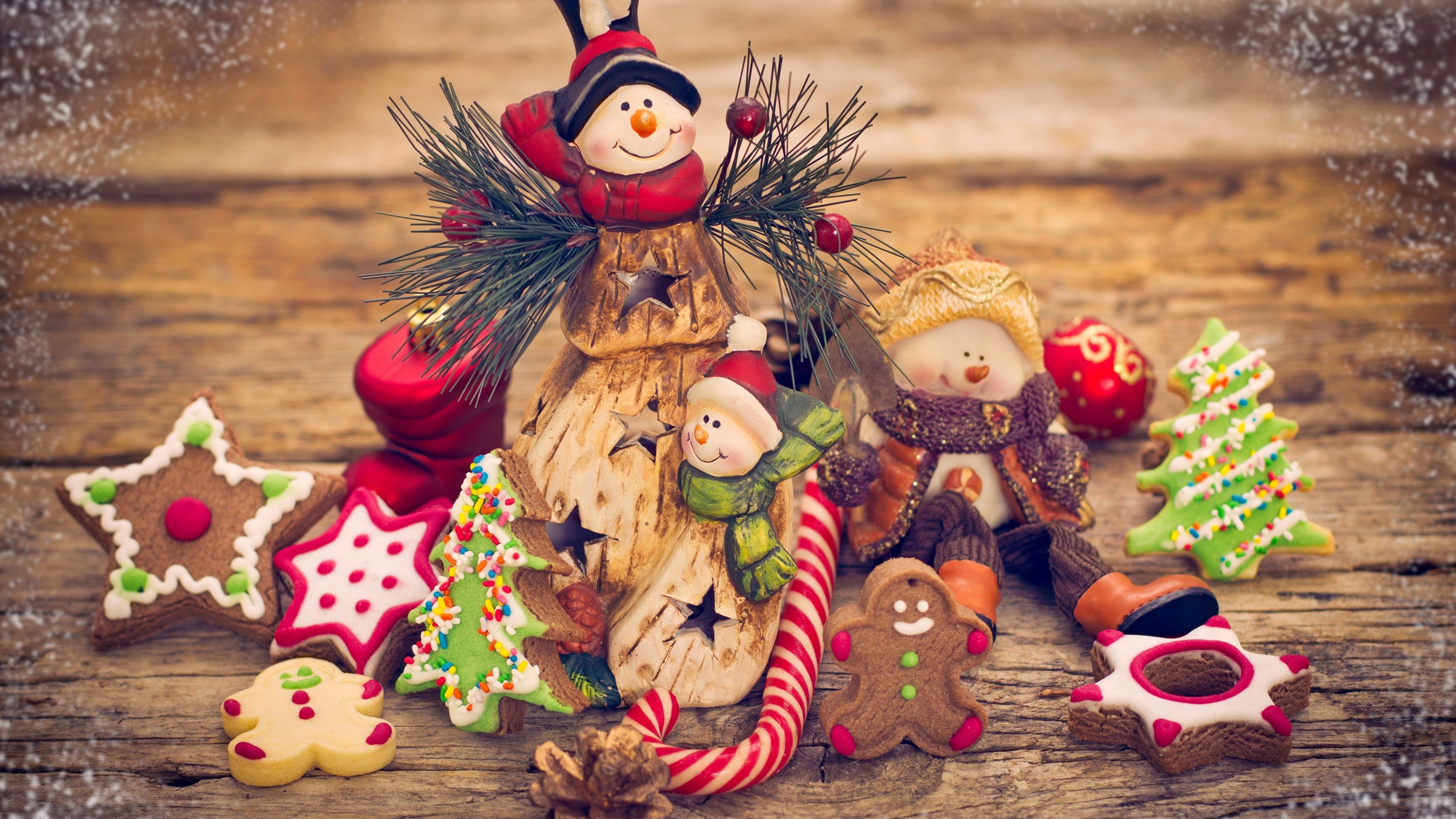 Christmas ornaments and cookies on wooden background HD Wallpaper