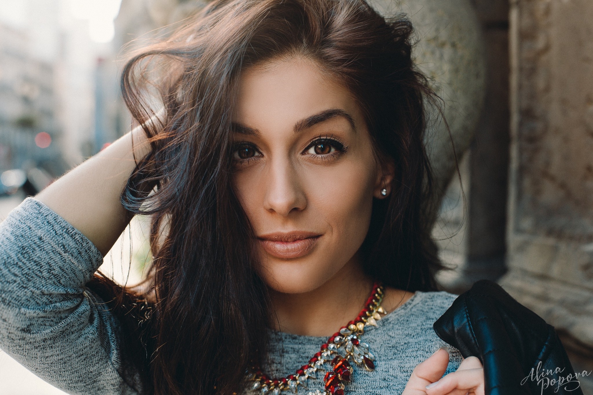 Woman with long brown hair and necklace HD Wallpaper