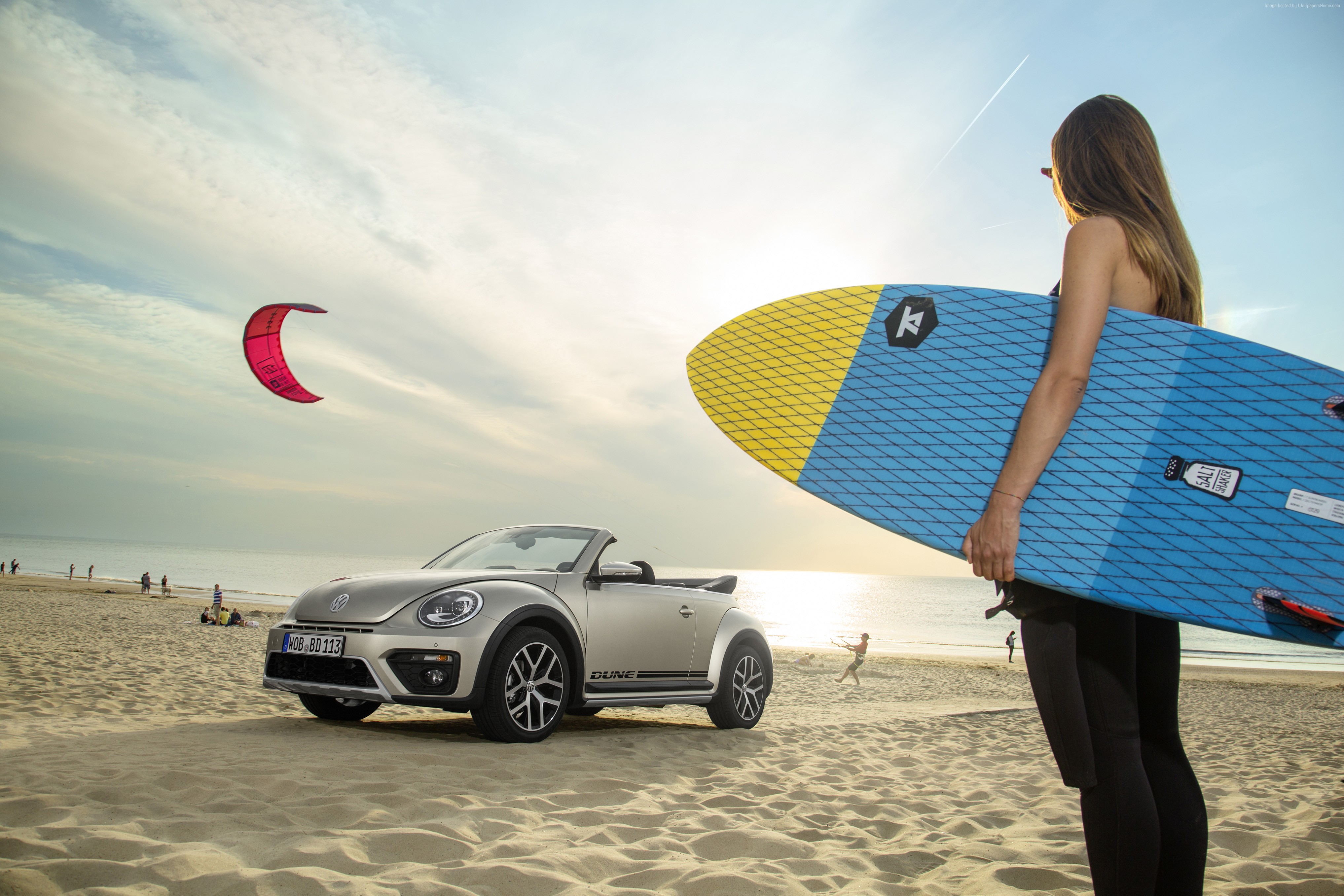 Volkswagen Beetle Dune convertible on a beach with a surfer HD Wallpaper