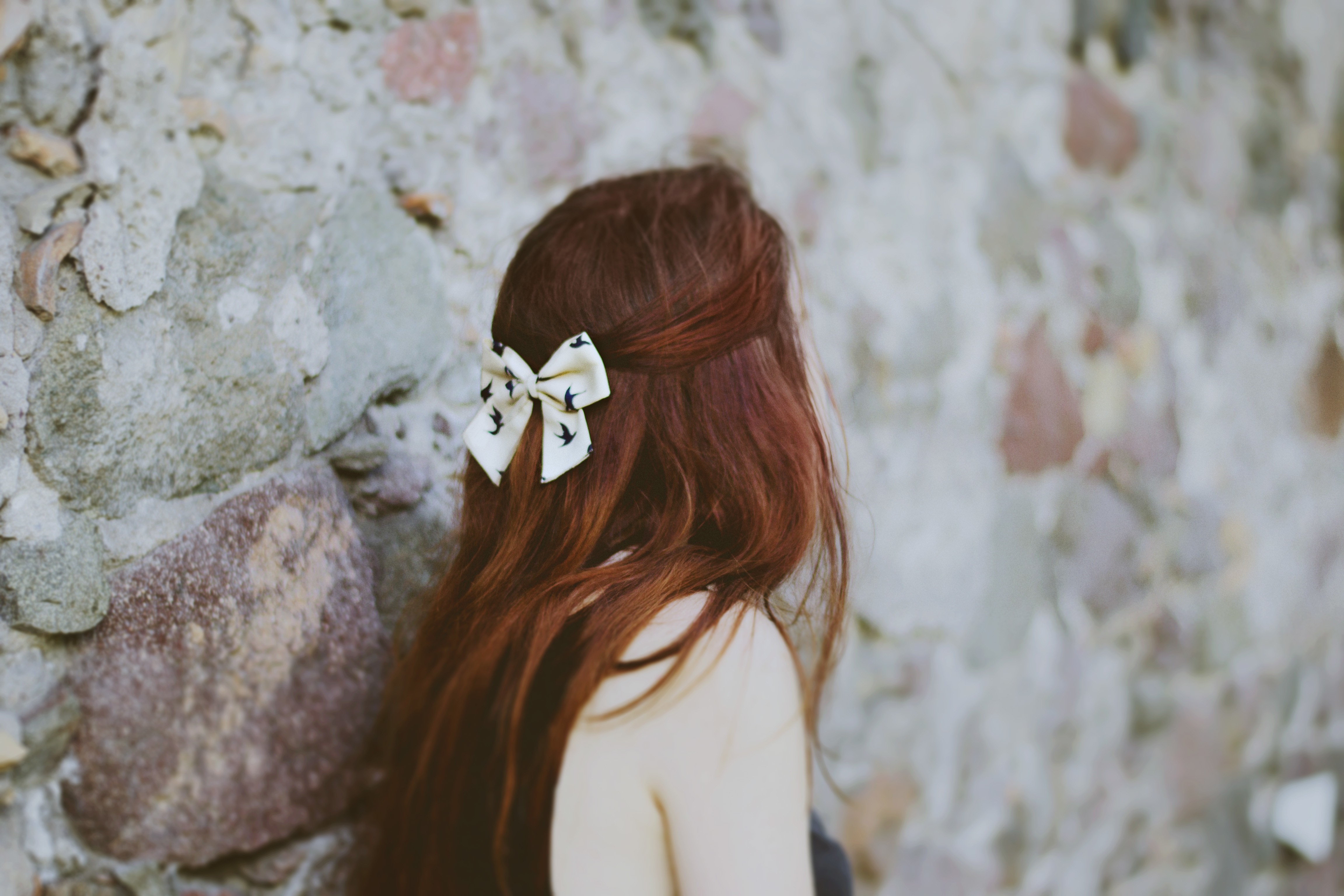 Woman with red hair and a bow in her hair HD Wallpaper
