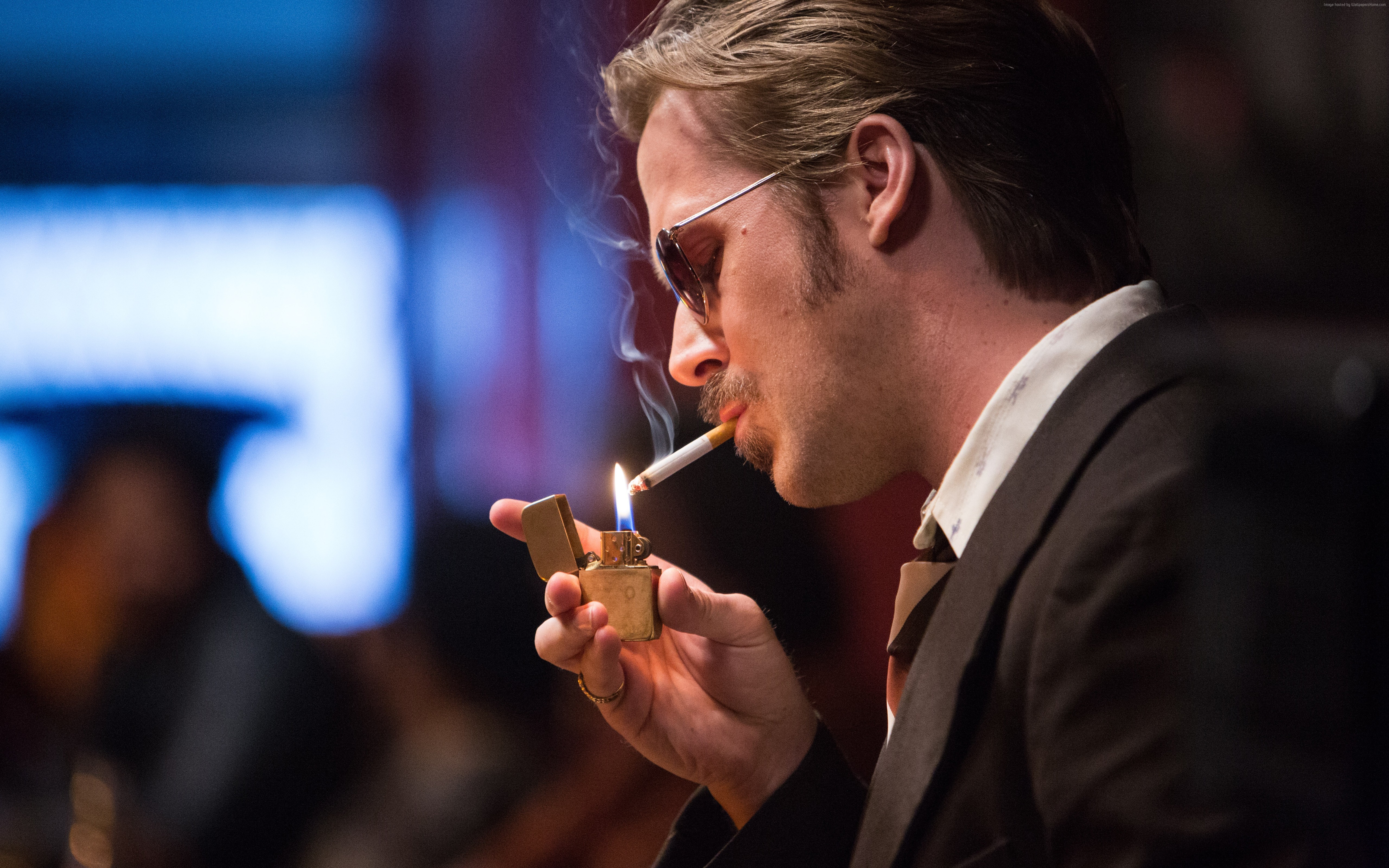 Ryan Gosling lighting a cigarette in The Nice Guys HD Wallpaper