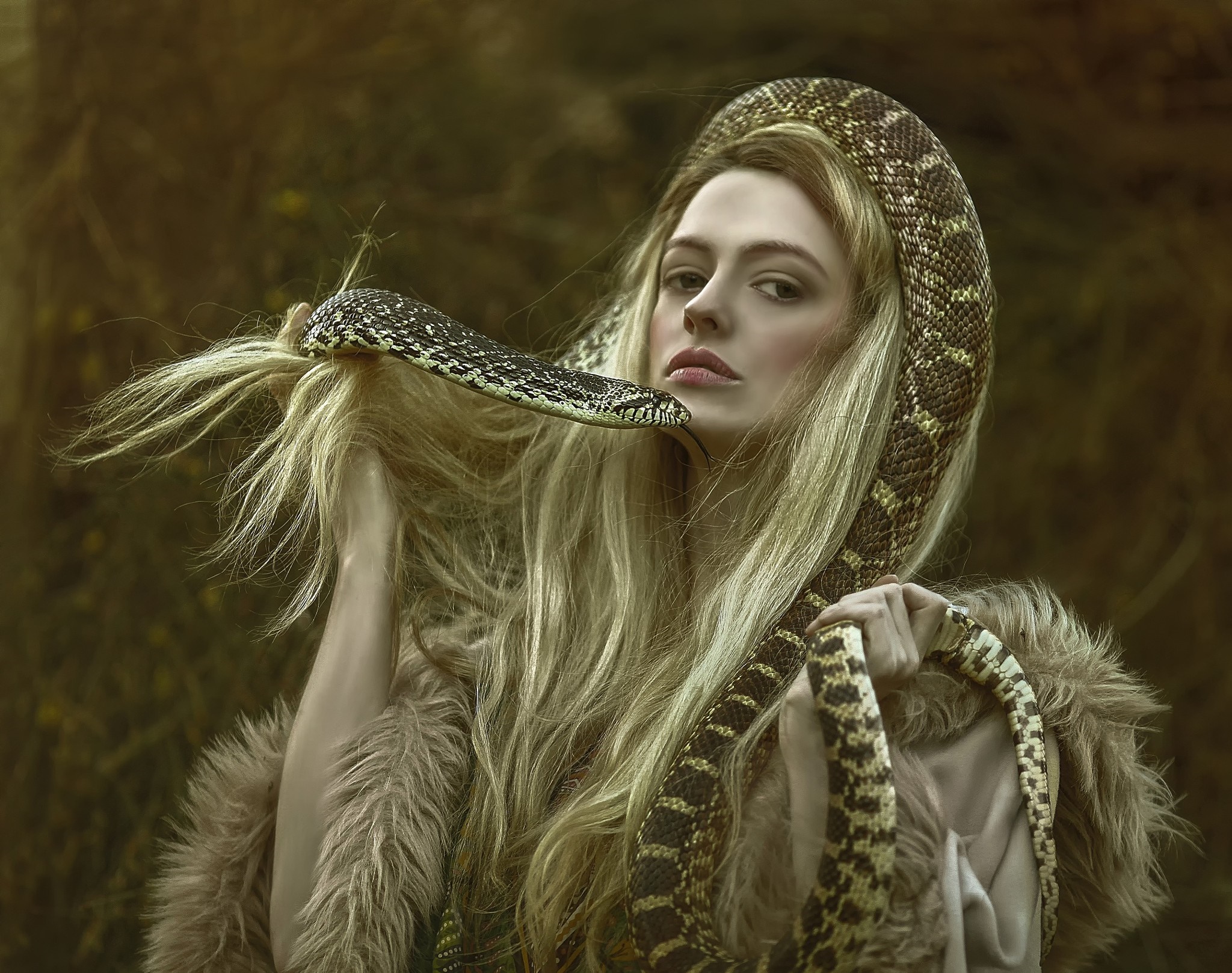 Woman with snake around her neck and hair HD Wallpaper