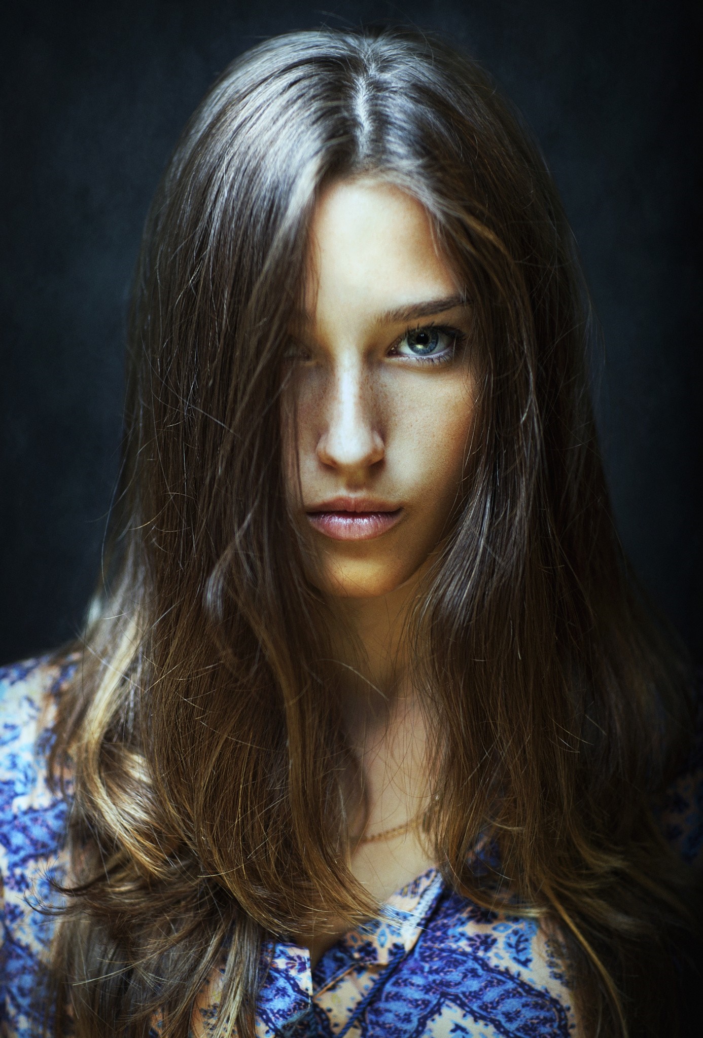 Portrait of a young woman with long brown hair HD Wallpaper